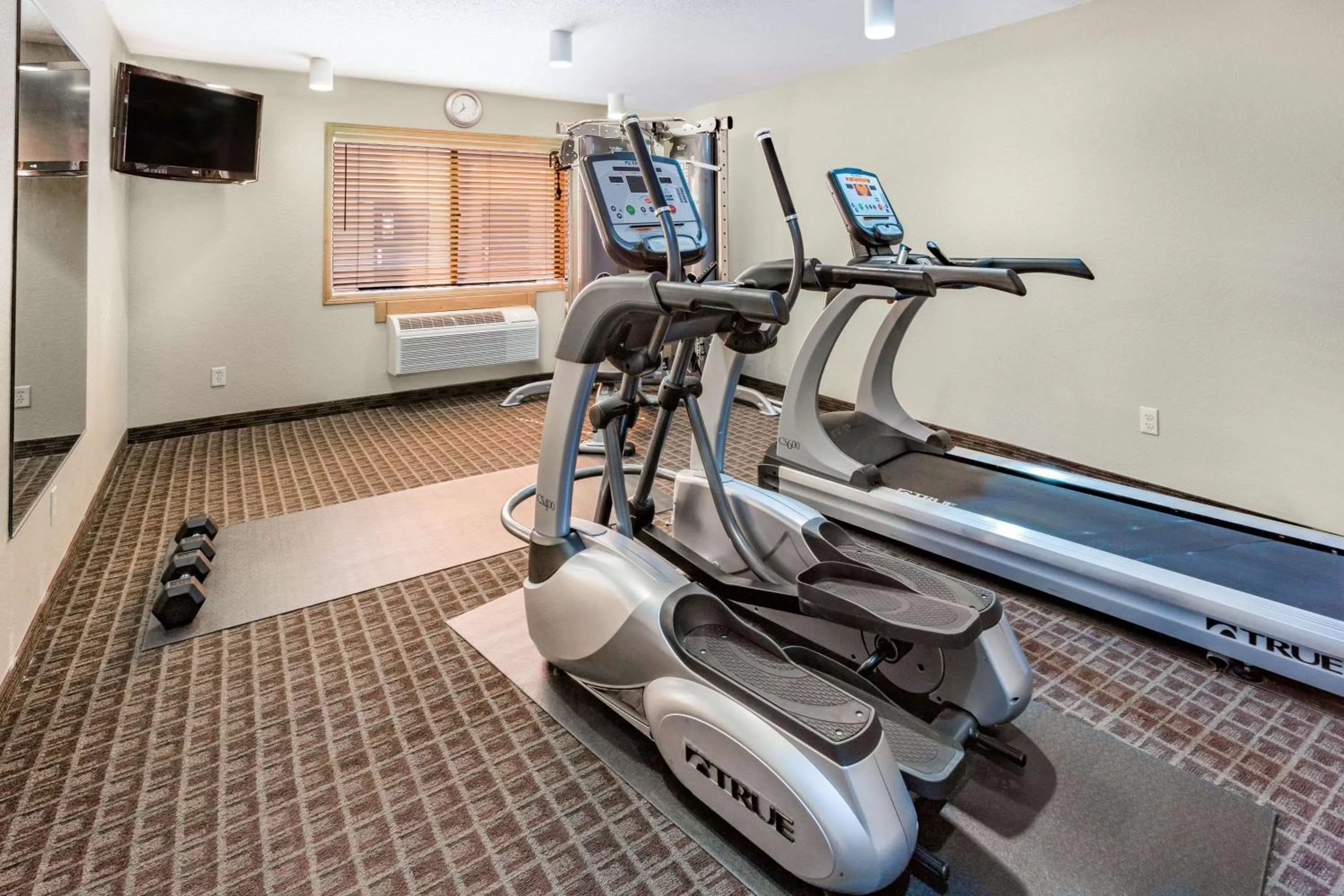 Fitness centre/facilities in AmericInn by Wyndham Medora