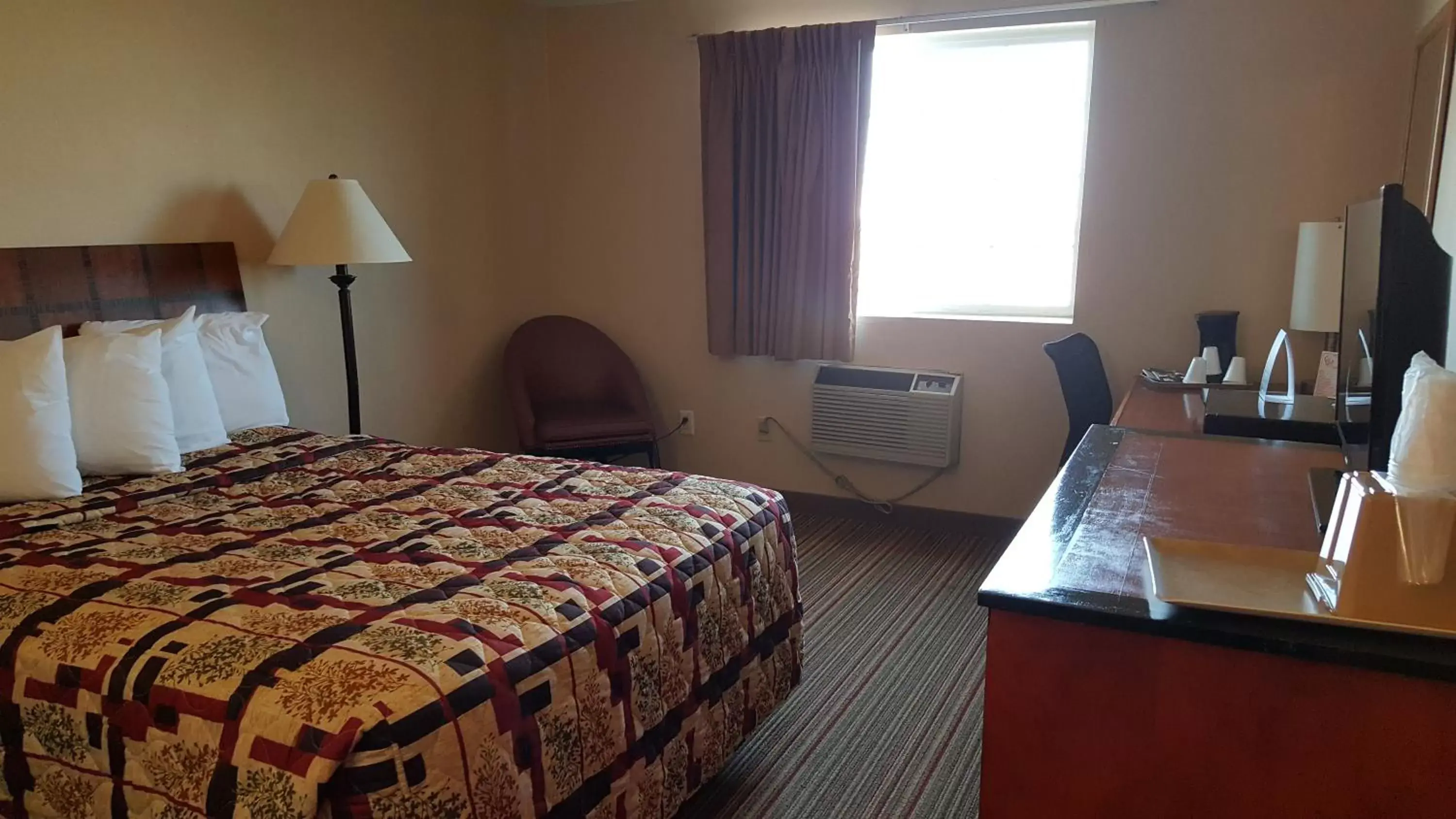 Bed in Knights Inn and Suites - Grand Forks