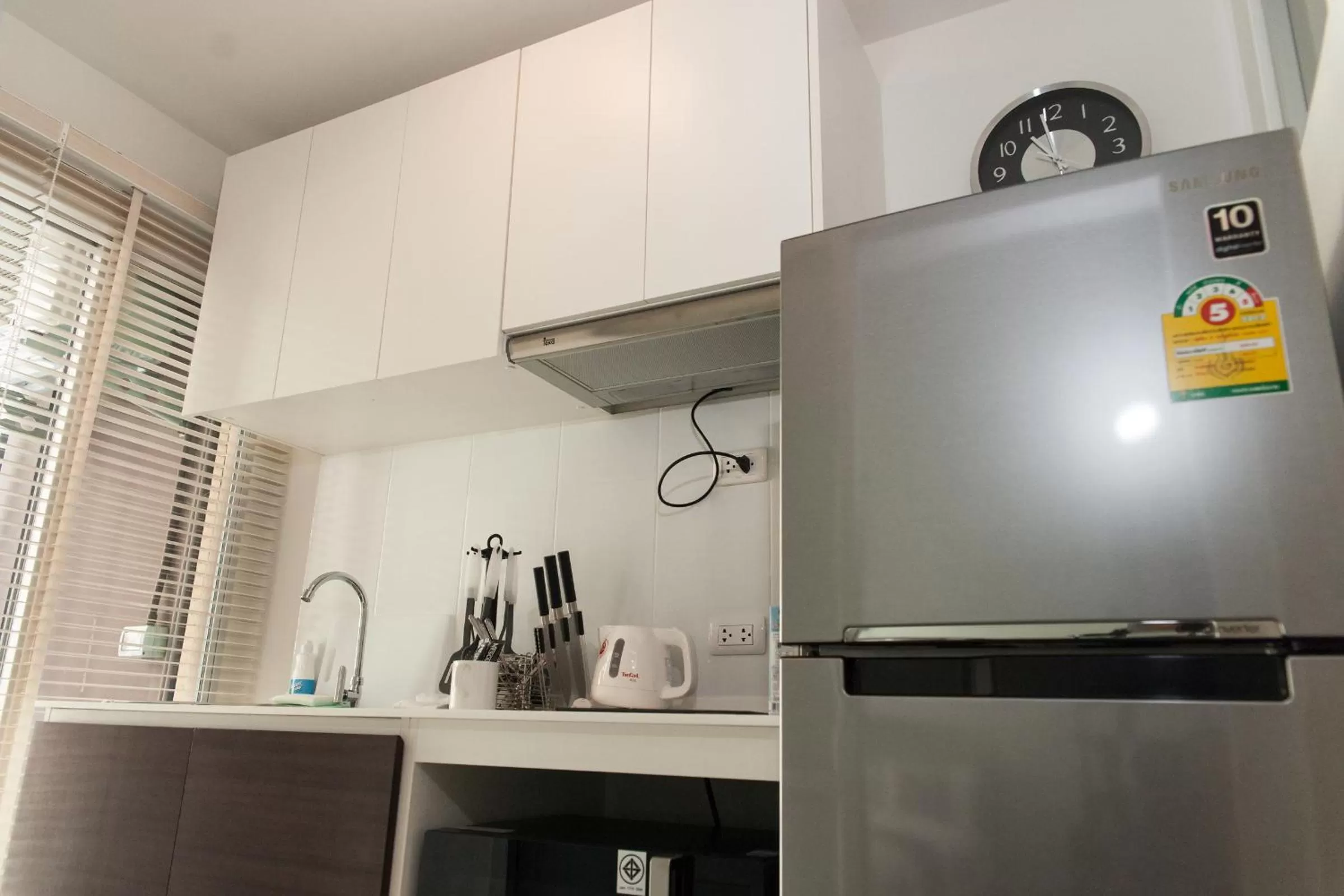 Kitchen or kitchenette in First Choice Suites SHA Plus Extra