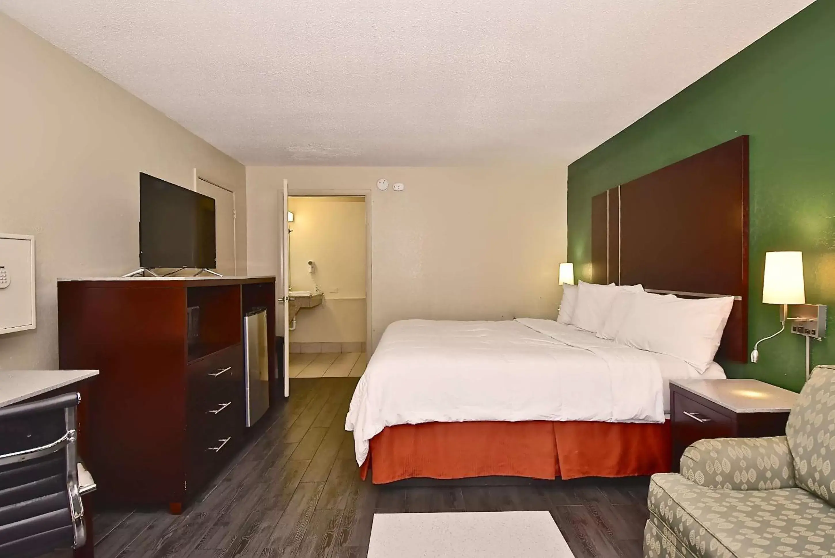 Photo of the whole room, Bed in SureStay Hotel by Best Western Sarasota Lido Beach