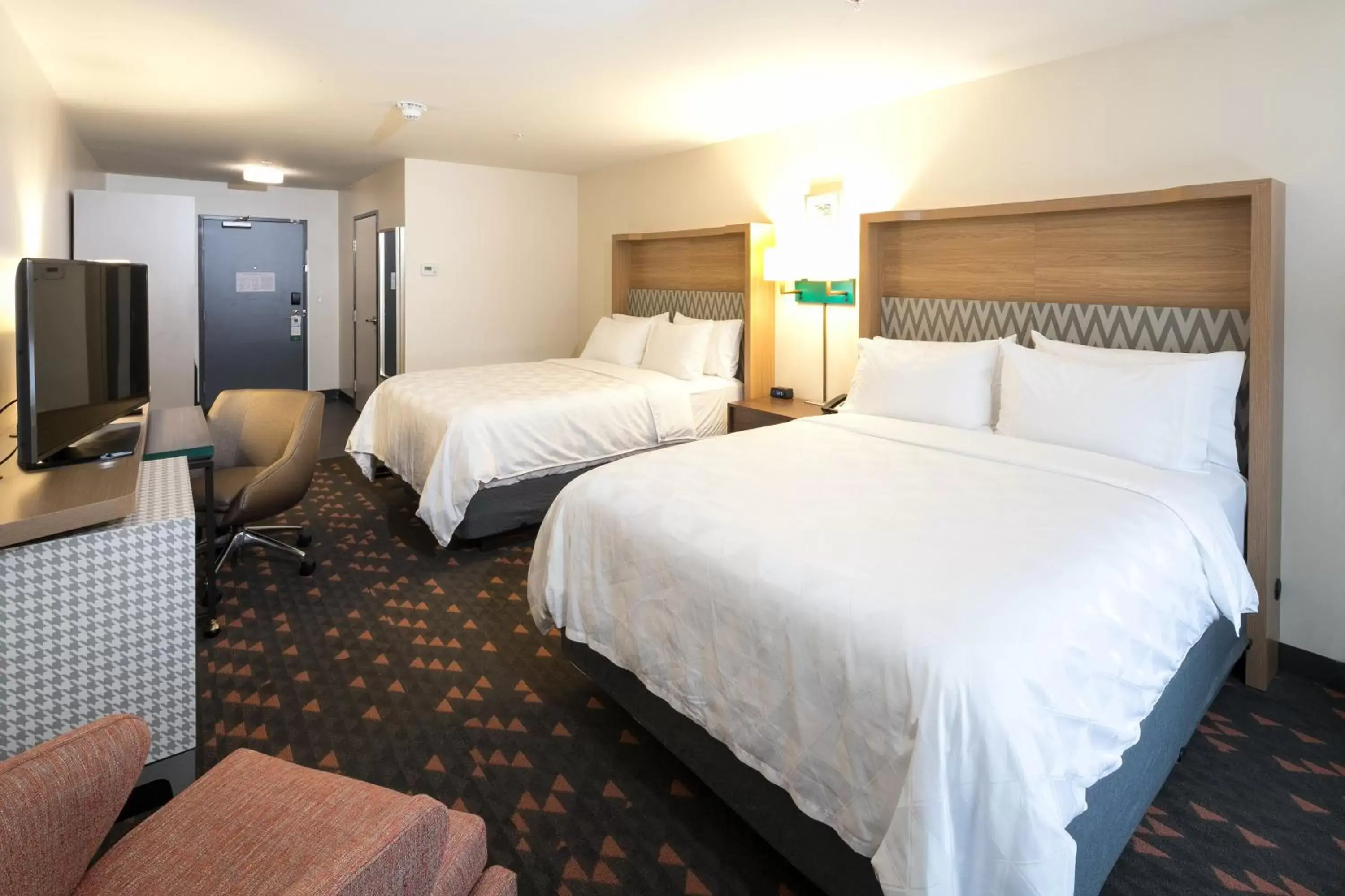 Photo of the whole room, Bed in Holiday Inn Hotel & Suites - Mount Pleasant, an IHG Hotel