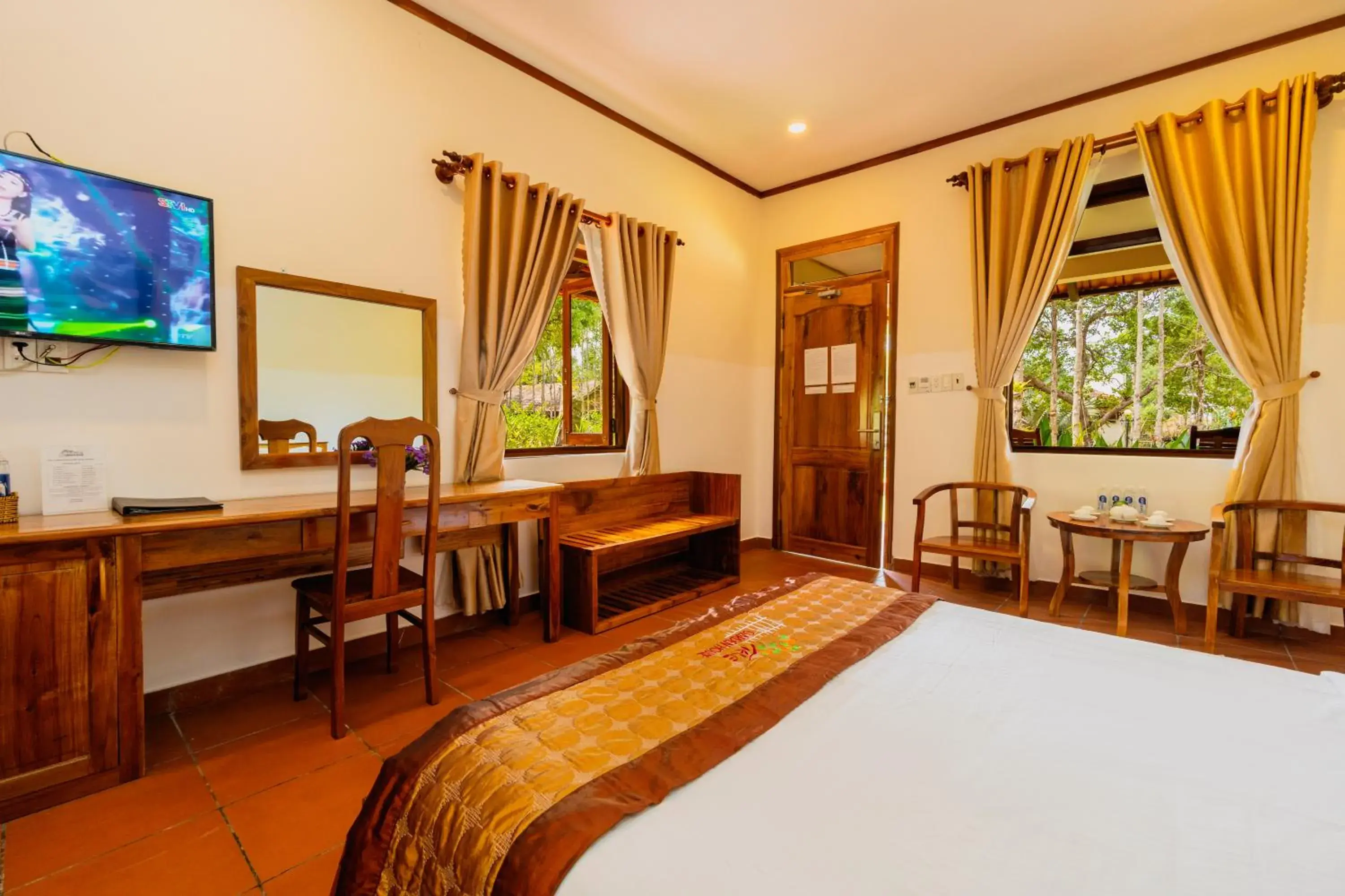 Bedroom, TV/Entertainment Center in The Garden House Phu Quoc Resort