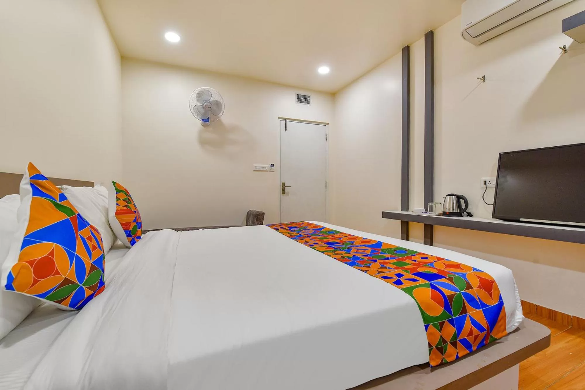 Bed in FabHotel Prime Rudra