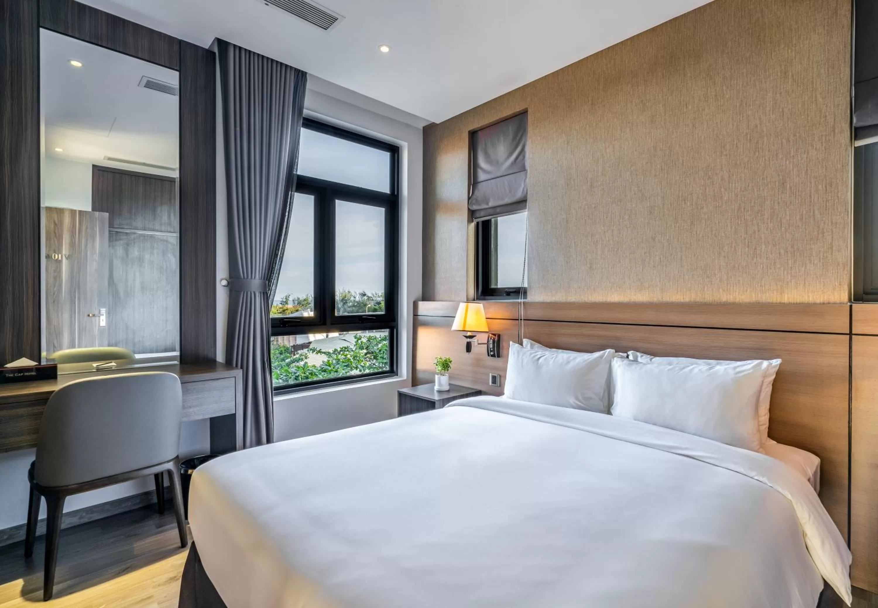 Bed in The Cap Hotel