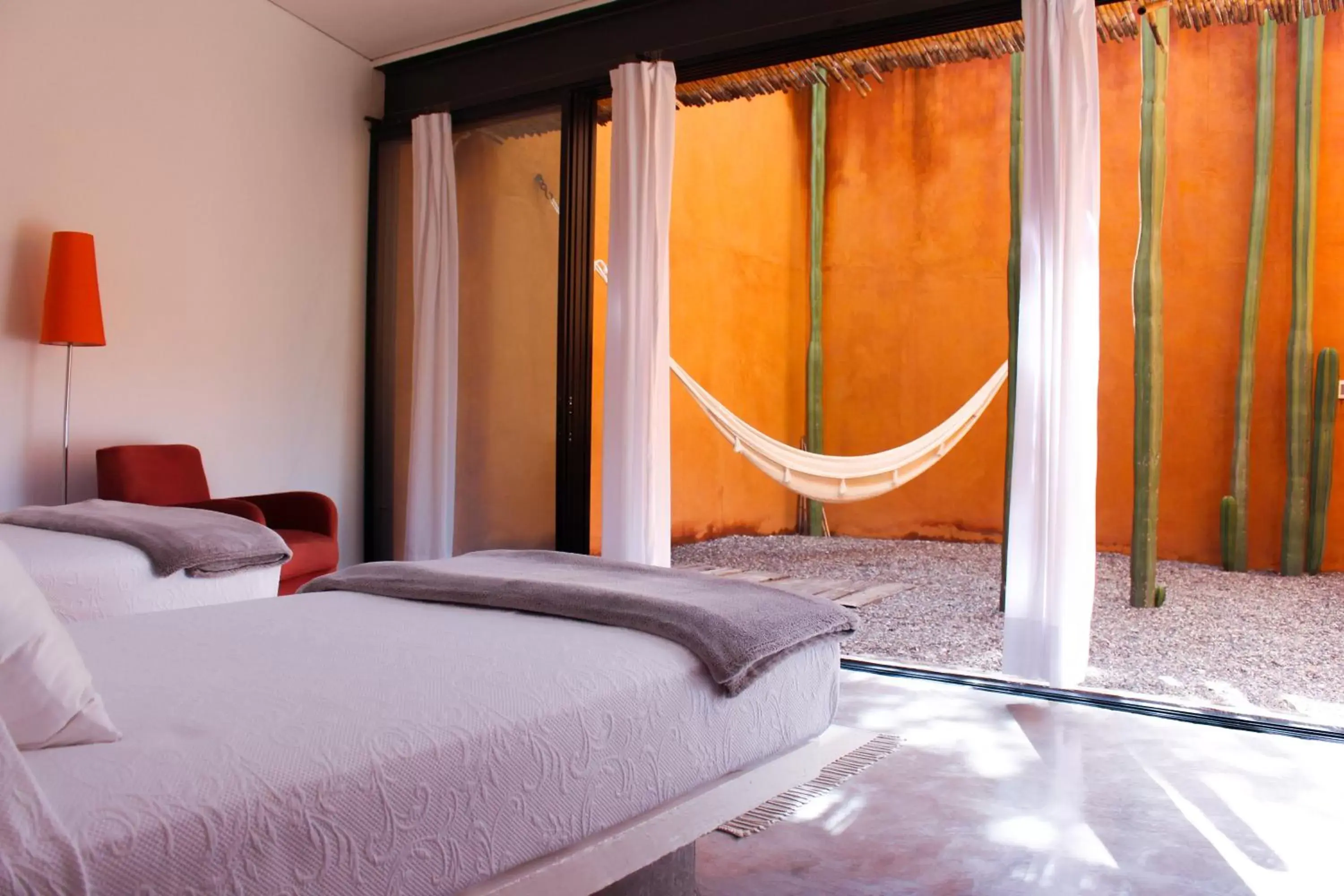 Bed in Hotel Cosijo - San Jeronimo Tlacochahuaya