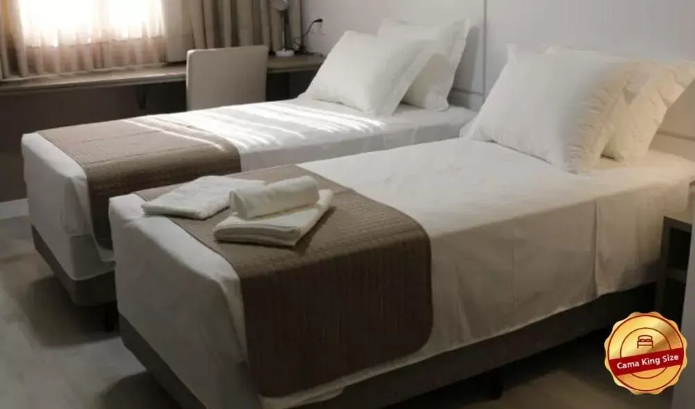 Bed in Tri Hotel Executive Indaial
