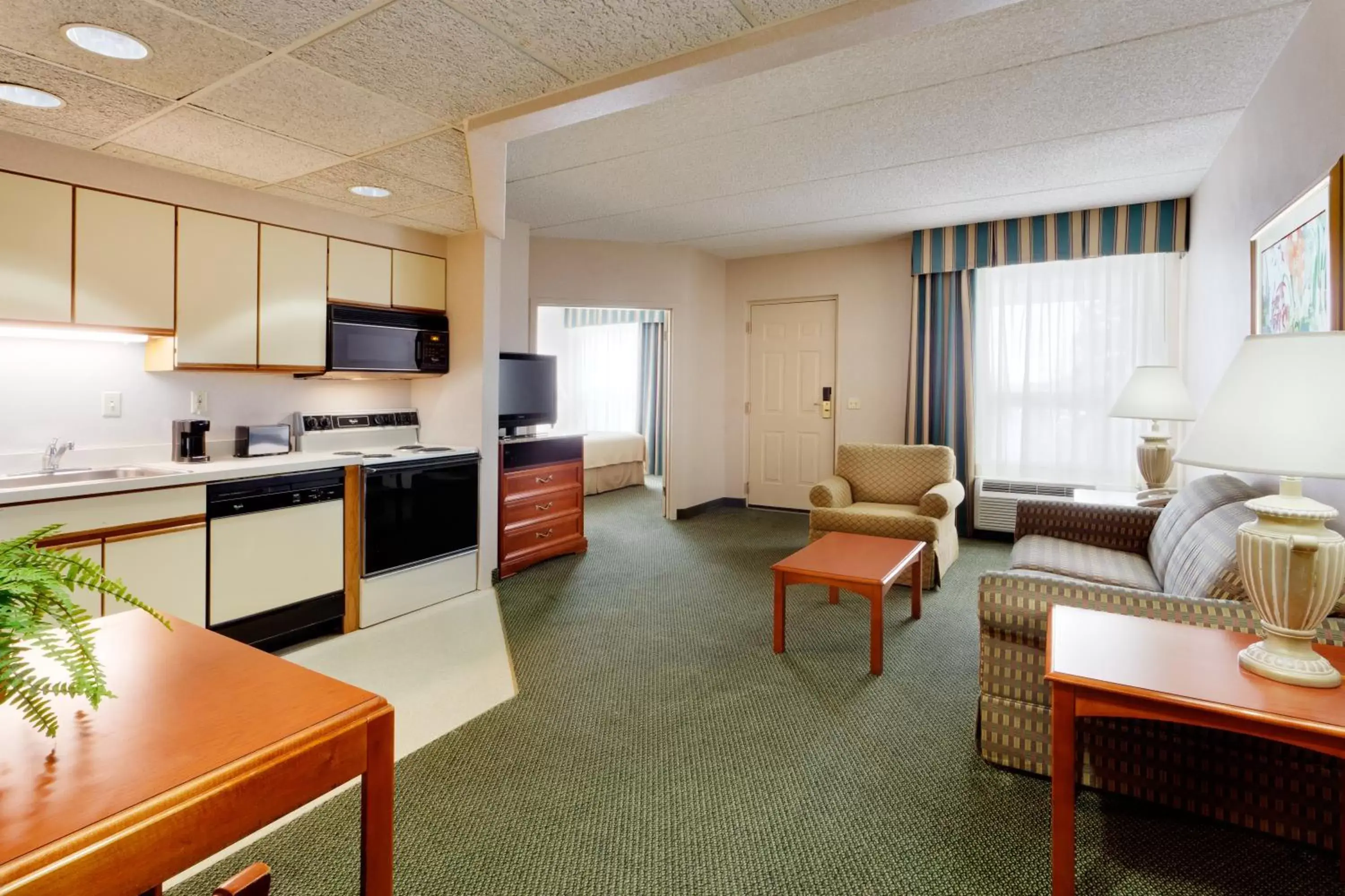 Photo of the whole room, Kitchen/Kitchenette in Burrstone Inn, Ascend Hotel Collection