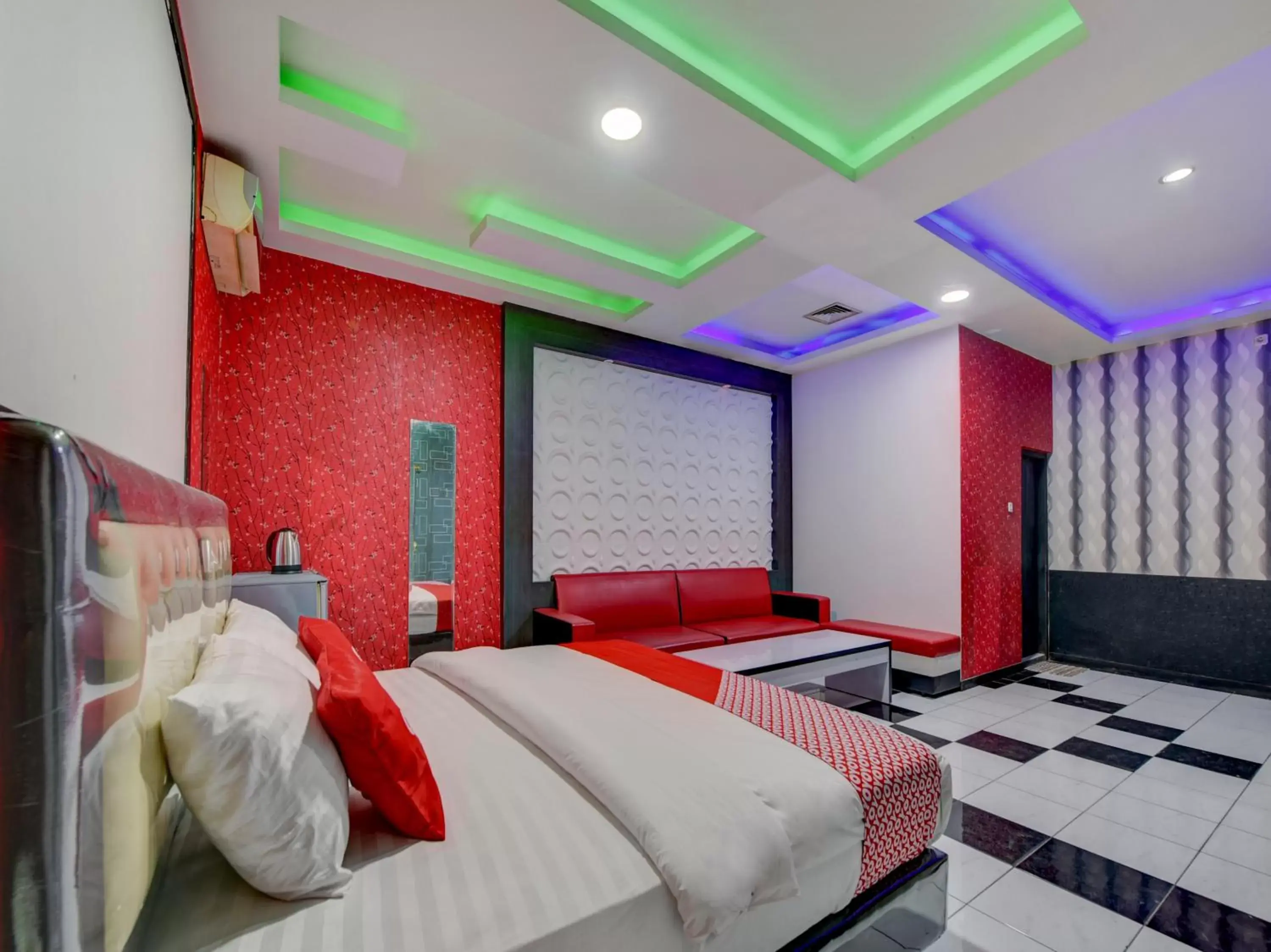 Bedroom in SUPER OYO 4010 Zaara Guest House Syariah