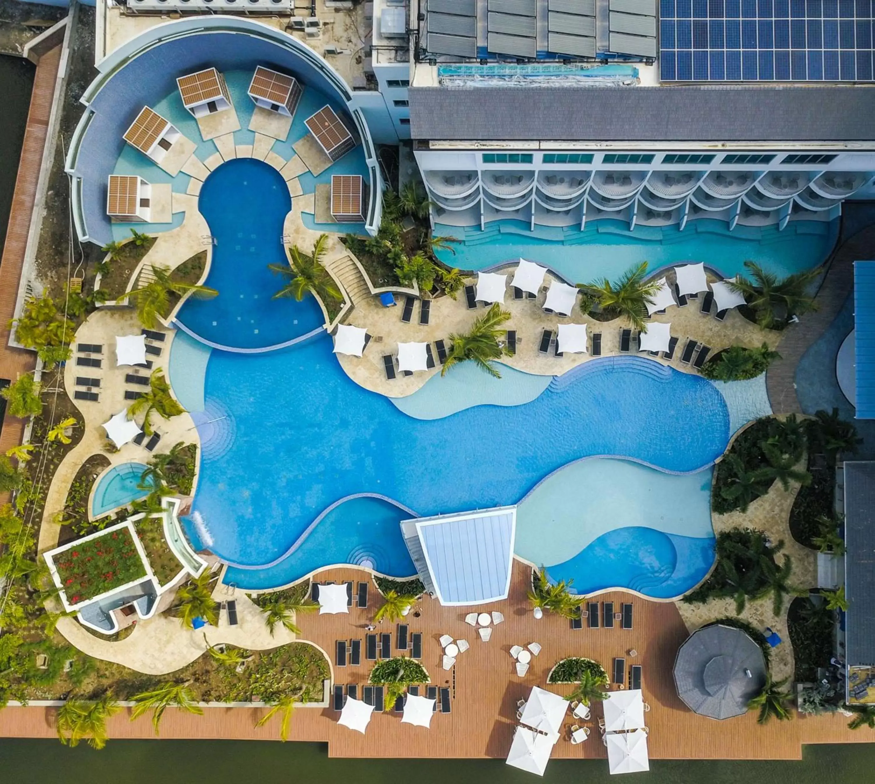 Swimming pool, Bird's-eye View in Harbor Club St Lucia, Curio Collection by Hilton