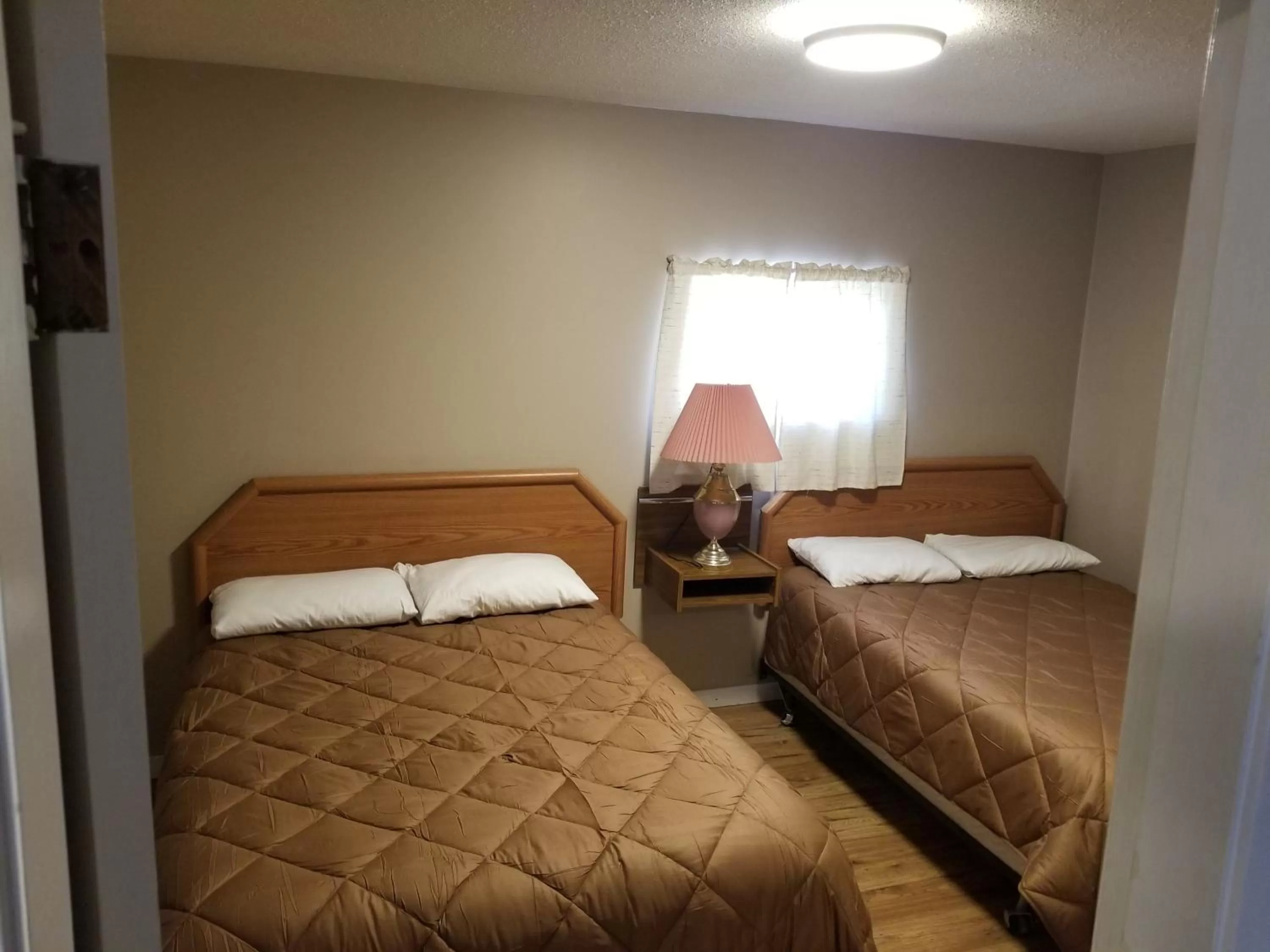 Bed in Apple Tree Inn