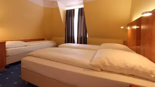 Quadruple Room in Aparthotel Astro - Nichtraucherhotel Quadruple Room in Aparthotel Astro - Nichtraucherhotel