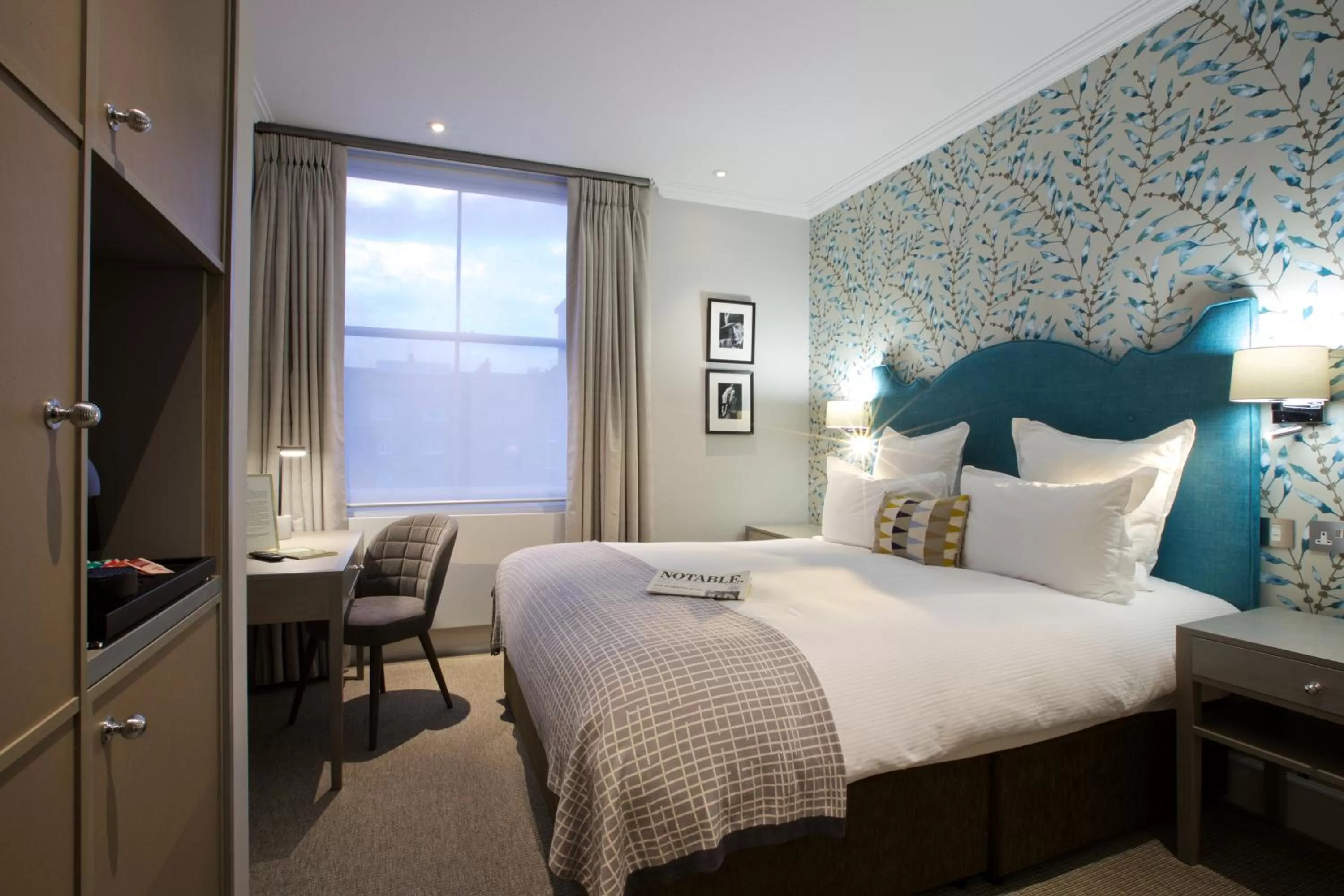 Bed in 54 Queen's Gate Hotel