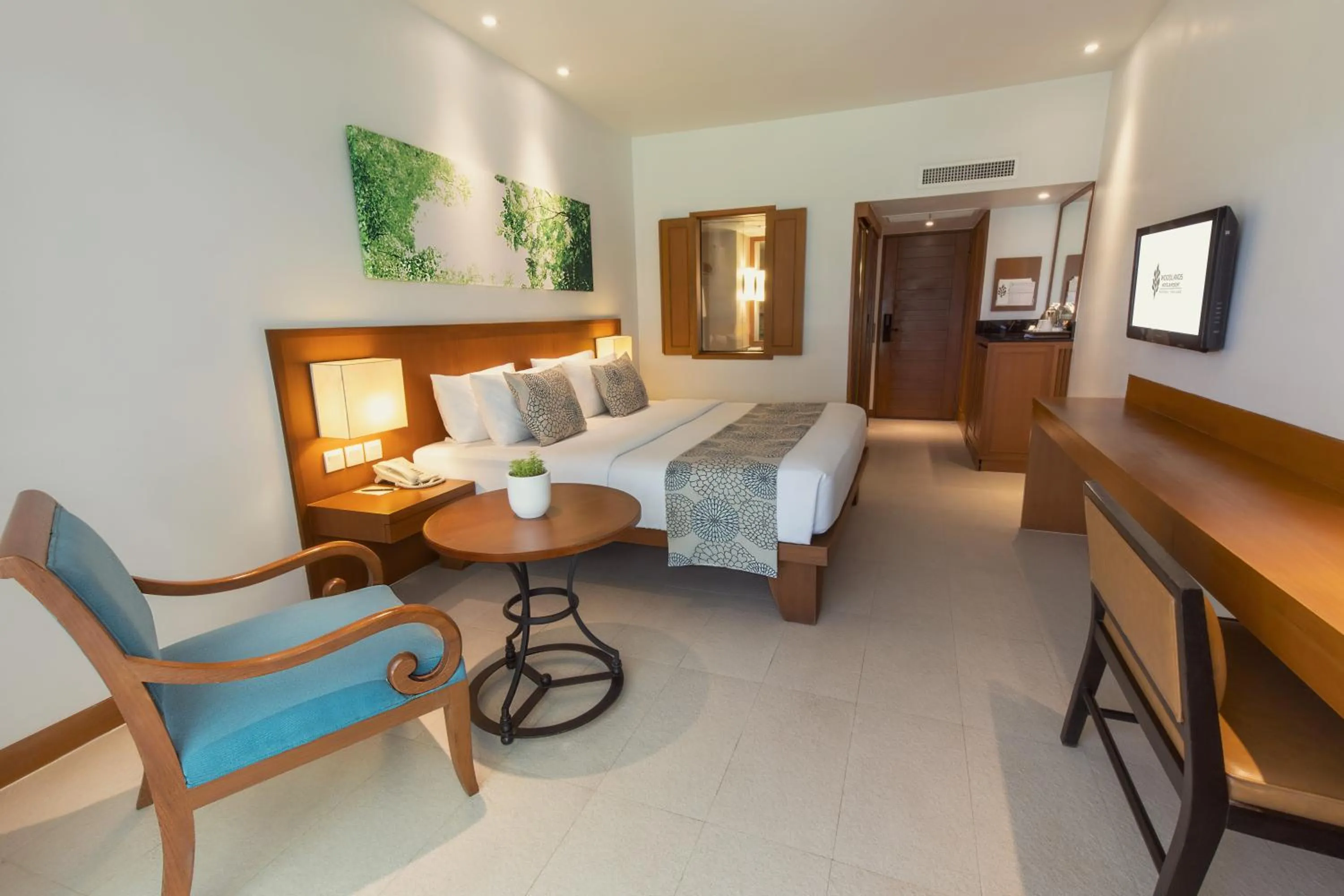 Bedroom, Bed in Woodlands Hotel and Resort Pattaya