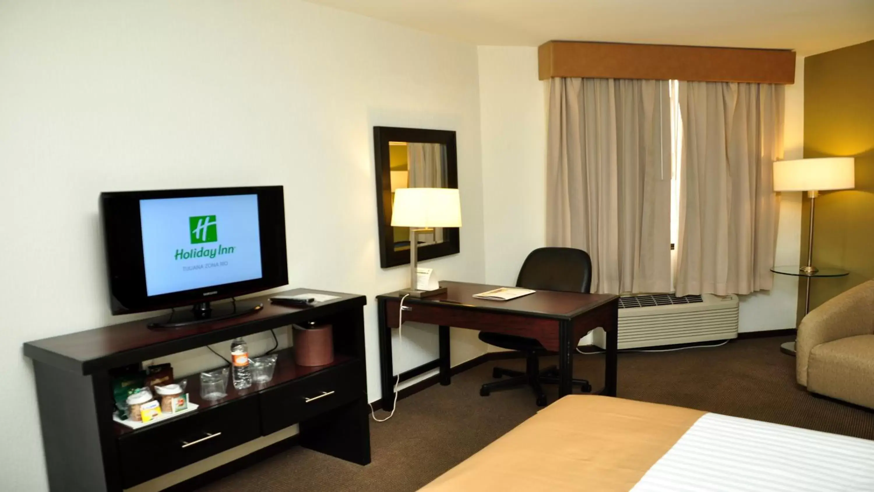 Photo of the whole room, TV/Entertainment Center in Holiday Inn Tijuana Zona Rio, an IHG Hotel