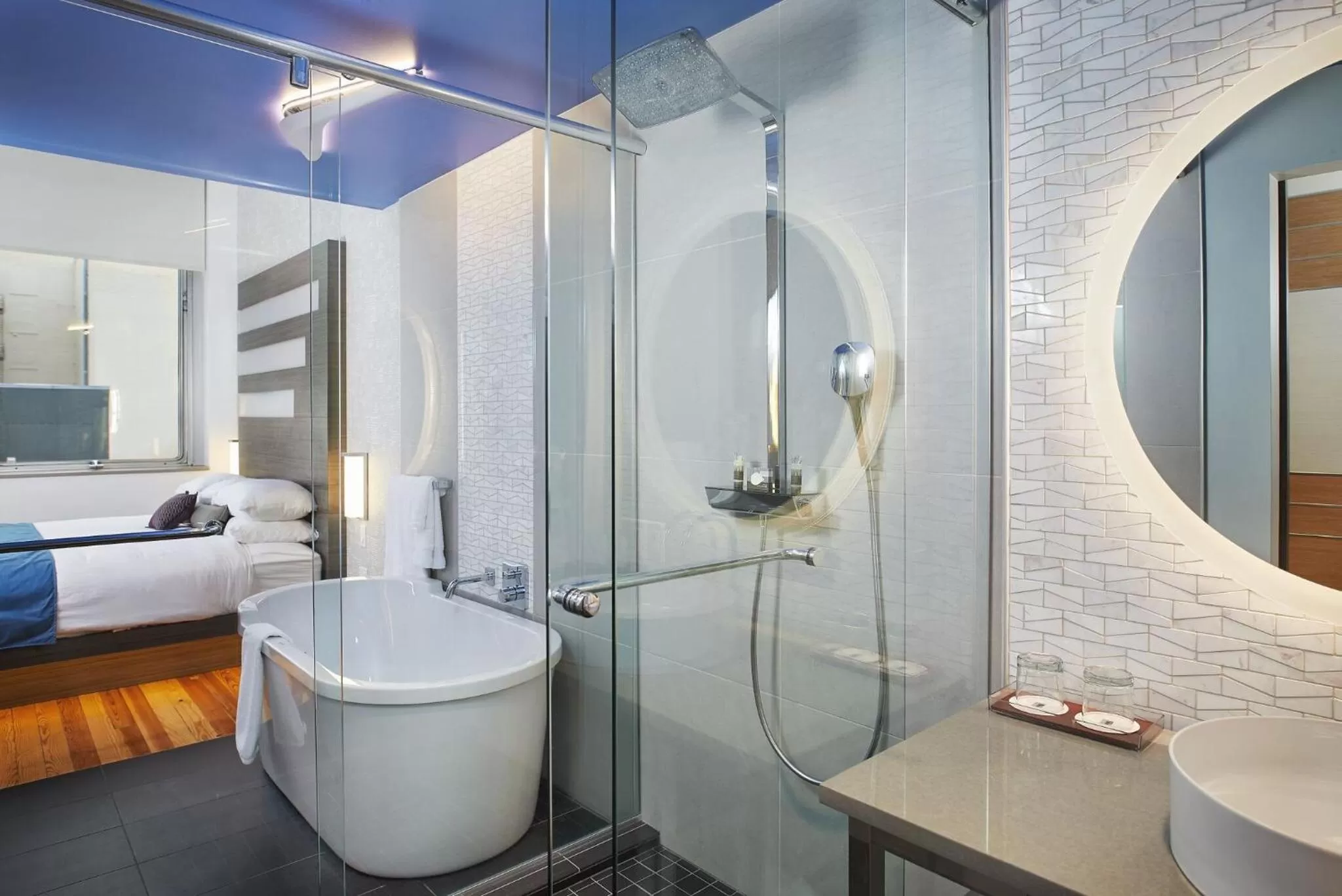 Bathroom, Bed in CityFlatsHotel - Grand Rapids, an Ascend Collection Hotel