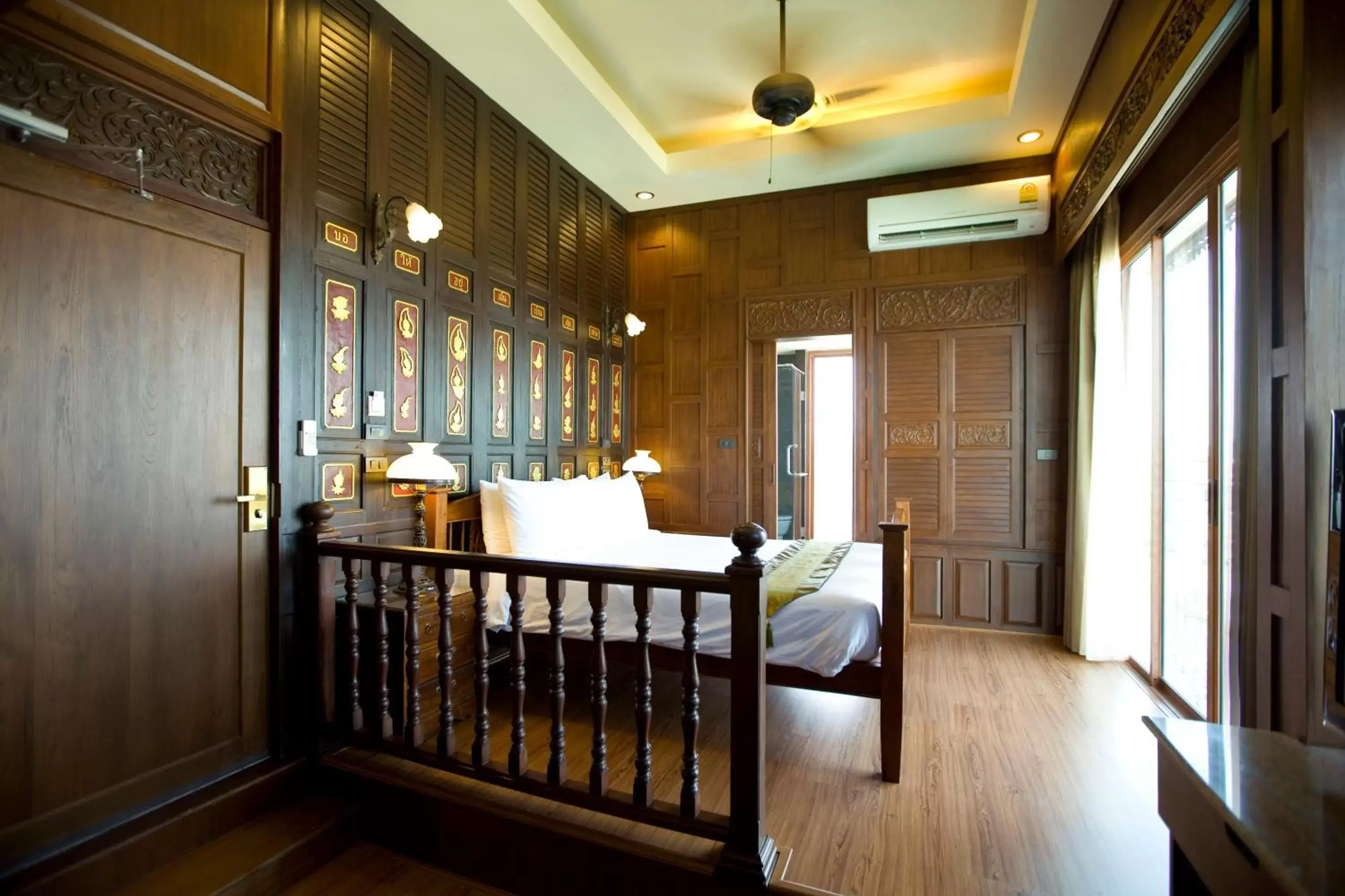 Photo of the whole room, Bed in Lamphu Tree House Boutique Hotel