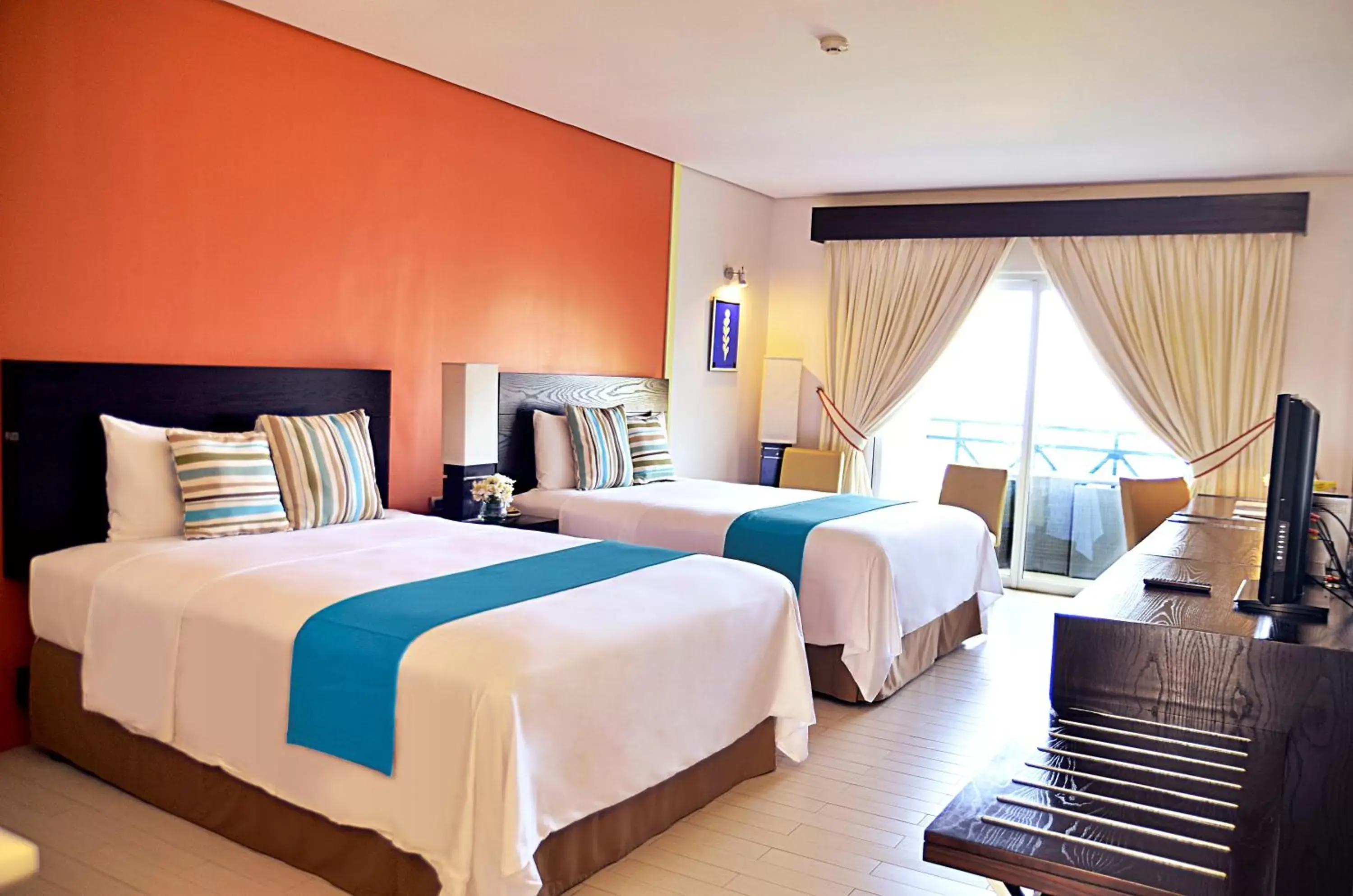 Bedroom, Bed in Thunderbird Resorts - Poro Point Bedroom, Bed in Thunderbird Resorts - Poro Point