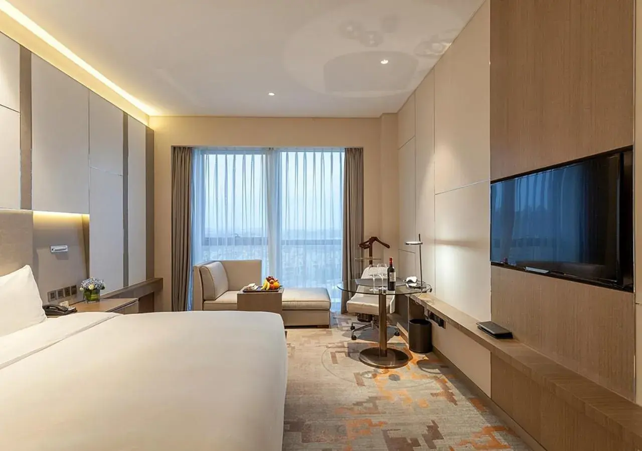 Photo of the whole room, TV/Entertainment Center in Radisson Exhibition Center Shanghai