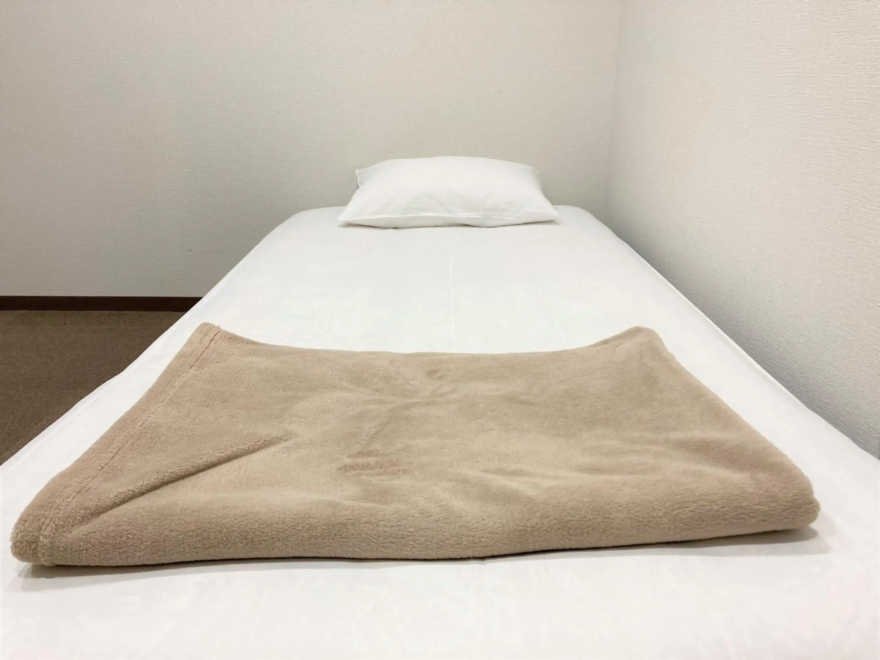 Bed in Tabist Tatebayashi Station Hotel
