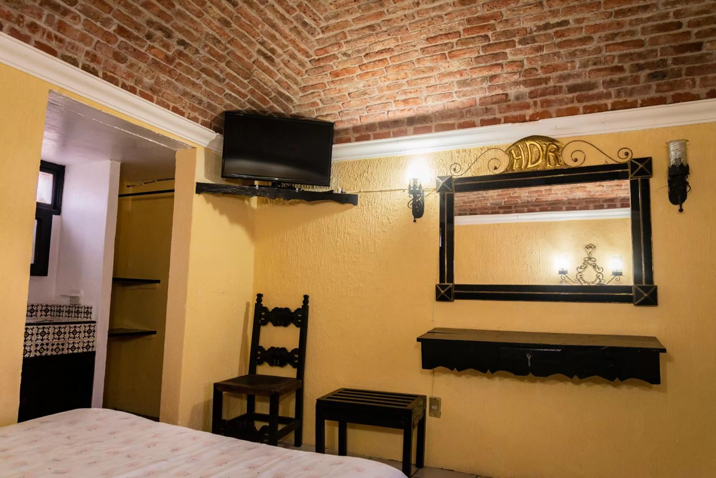 TV and multimedia, TV/Entertainment Center in Hotel Hacienda de Cobos