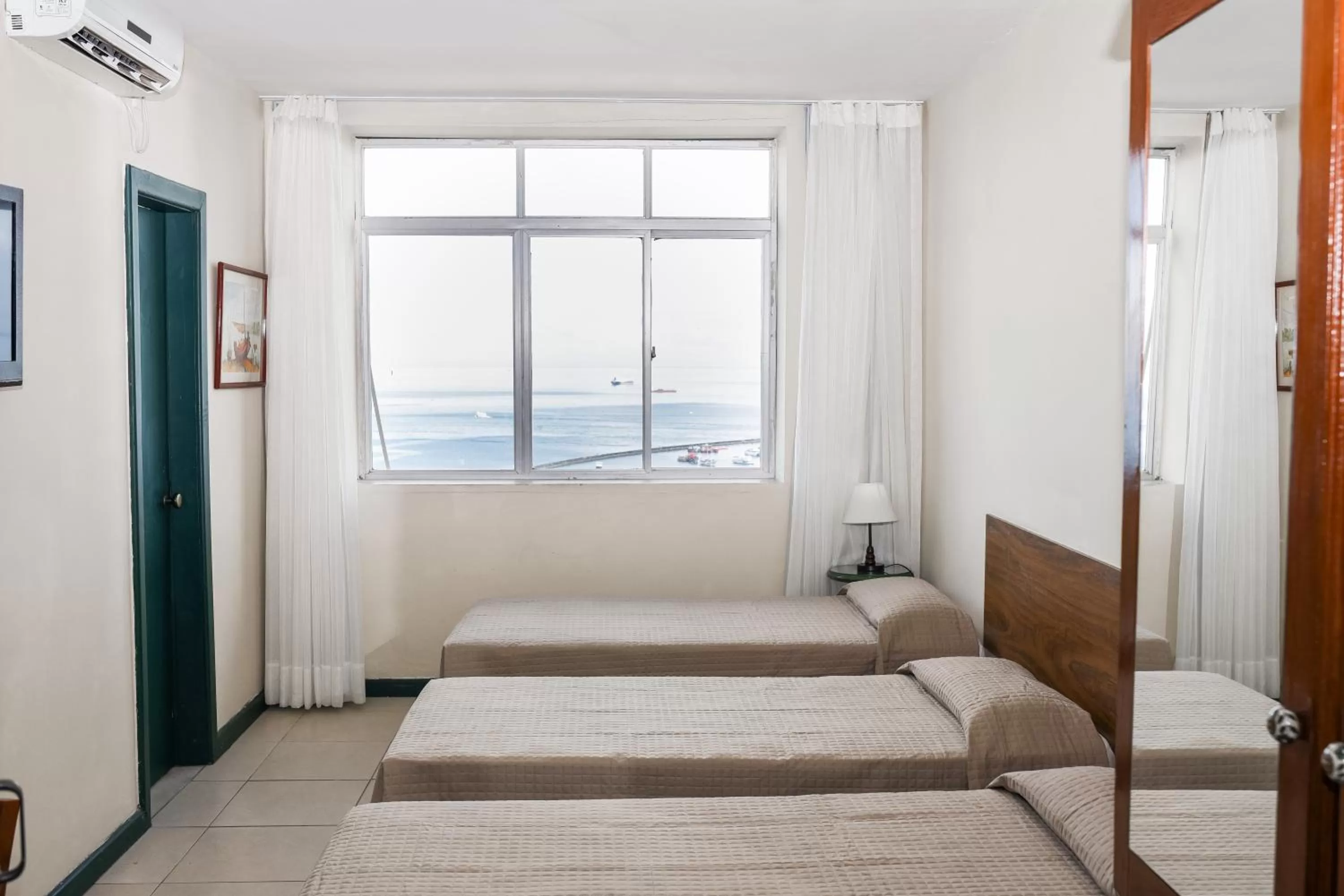 Bed in Pousada Colonial Chile