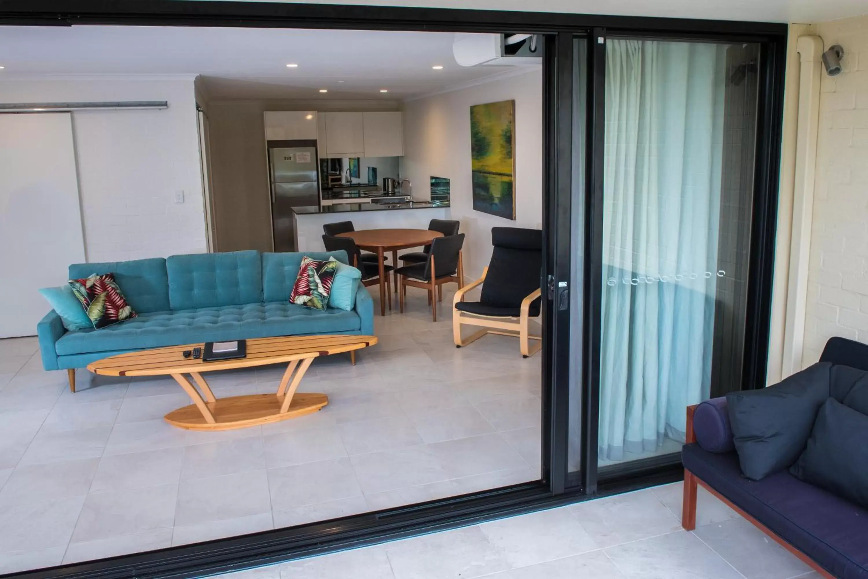 Patio, Seating Area in The Oasis Apartments and Treetop Houses