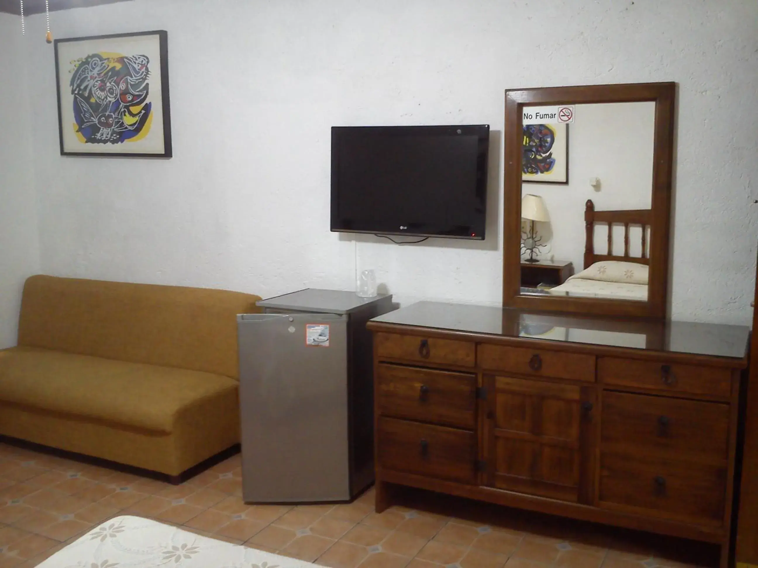 Photo of the whole room, TV/Entertainment Center in CasaGrande Posada Ejecutiva