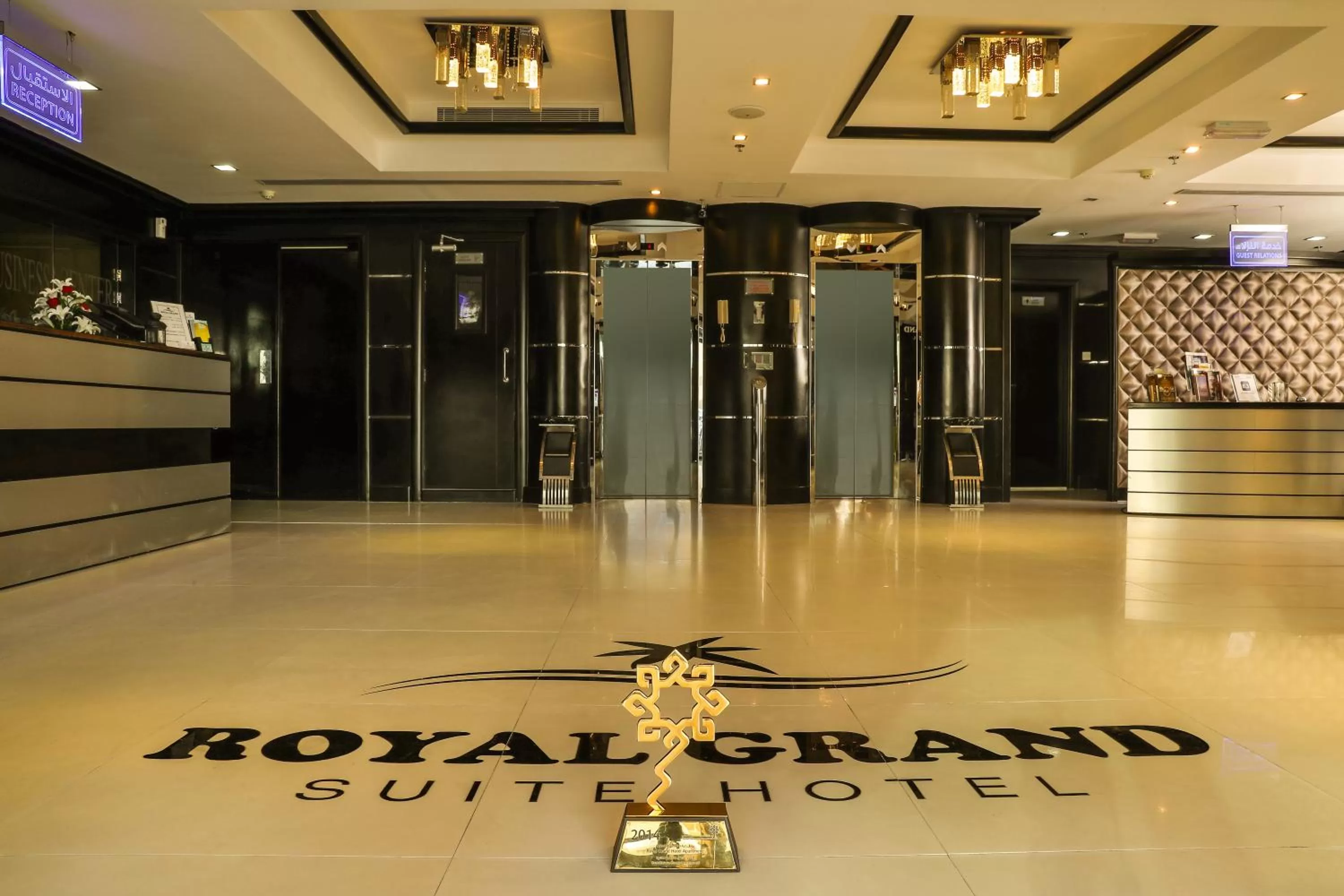 Lobby or reception in Royal Grand Suite Hotel