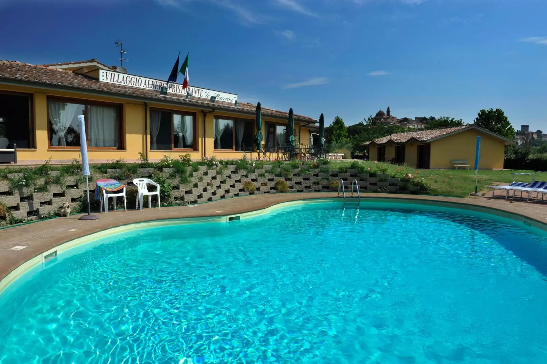 Property building, Swimming Pool in Le Macerine