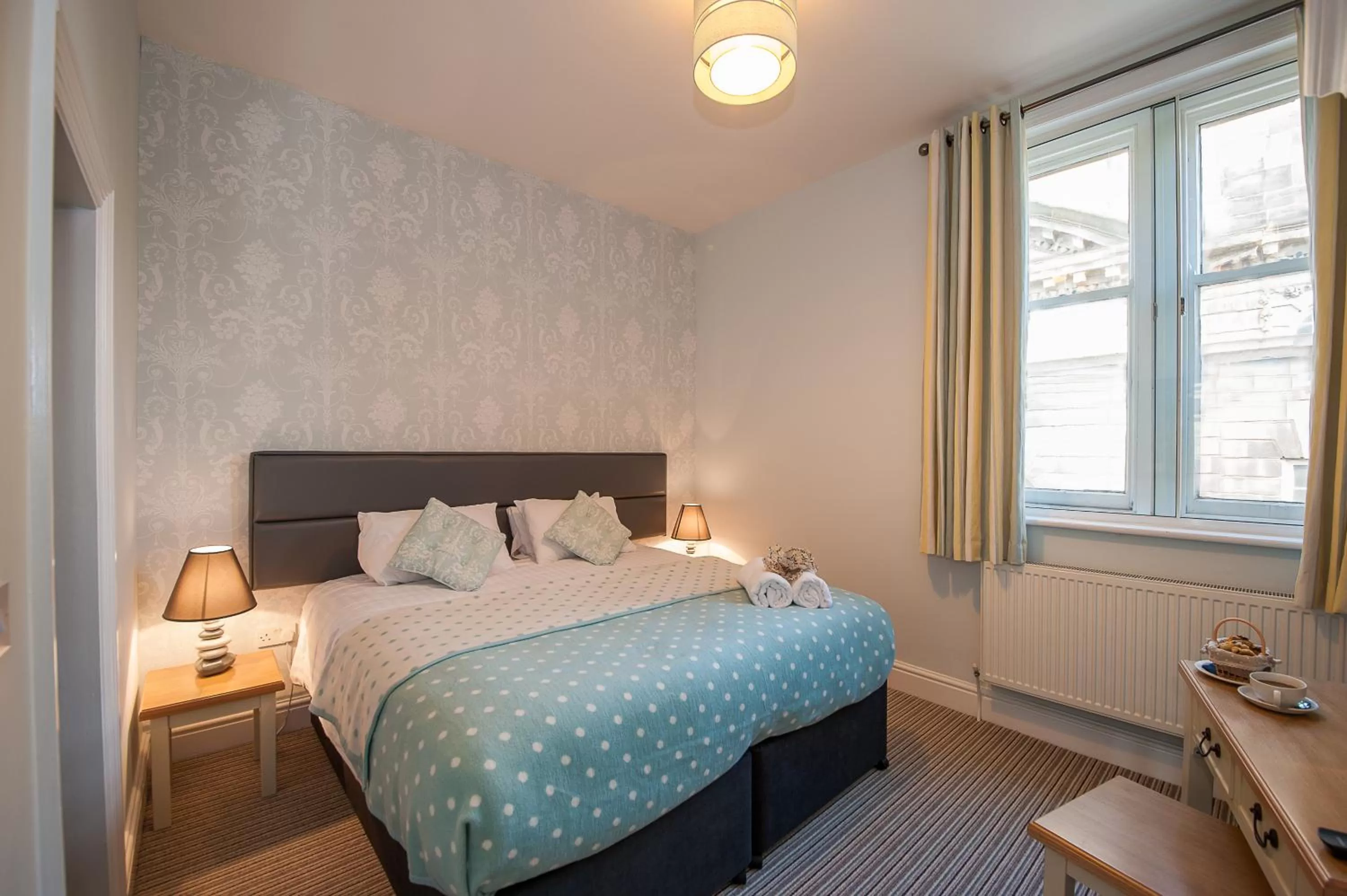 Bed in The Royal Hotel and Bar