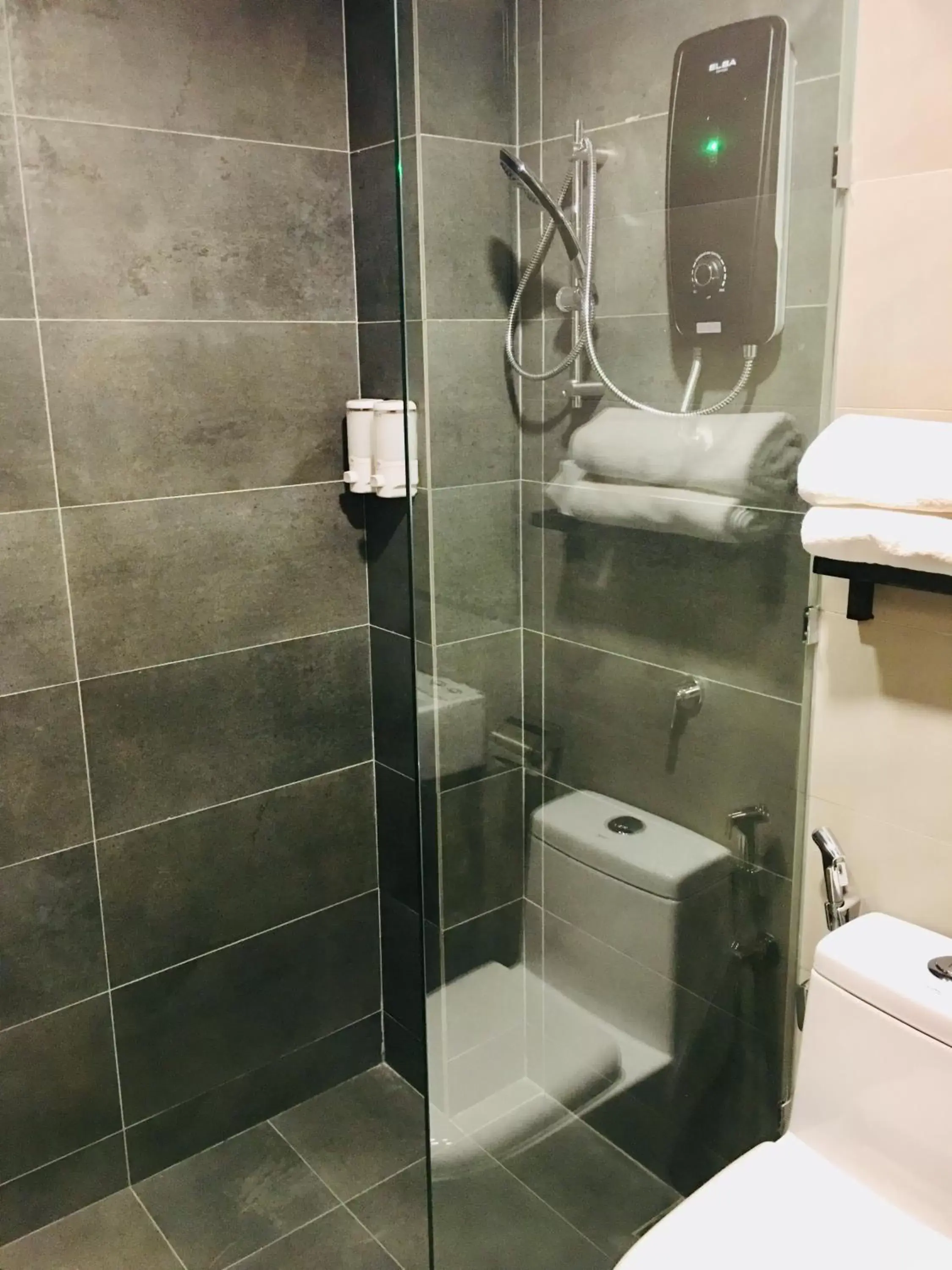 Shower, Bathroom in Enclave Hotel