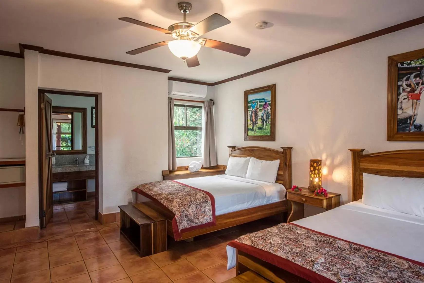 Photo of the whole room, Bed in Hacienda Guachipelin Volcano Ranch Hotel & Hot Springs