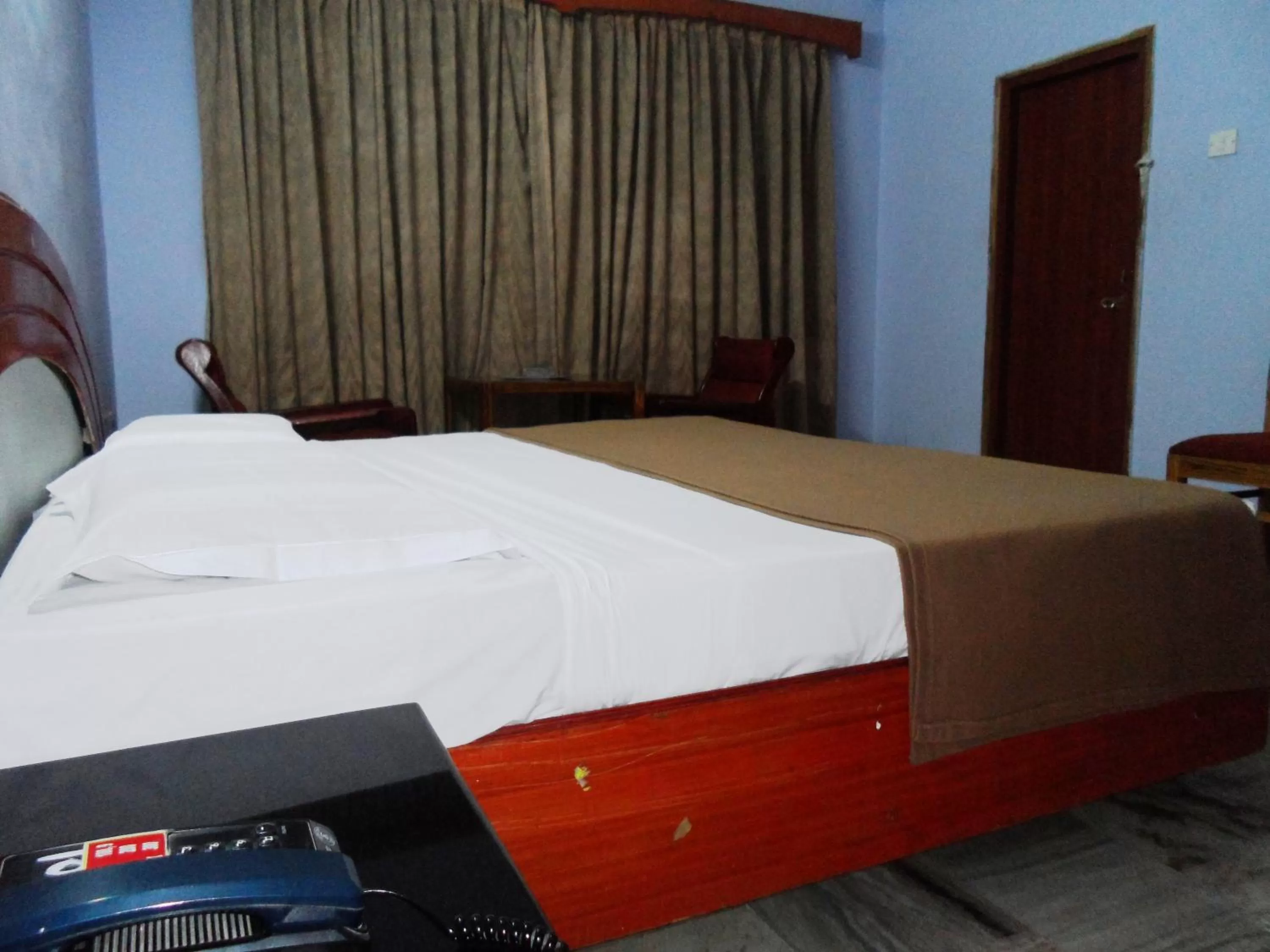 Photo of the whole room, Bed in Hotel Bhimas Paradise