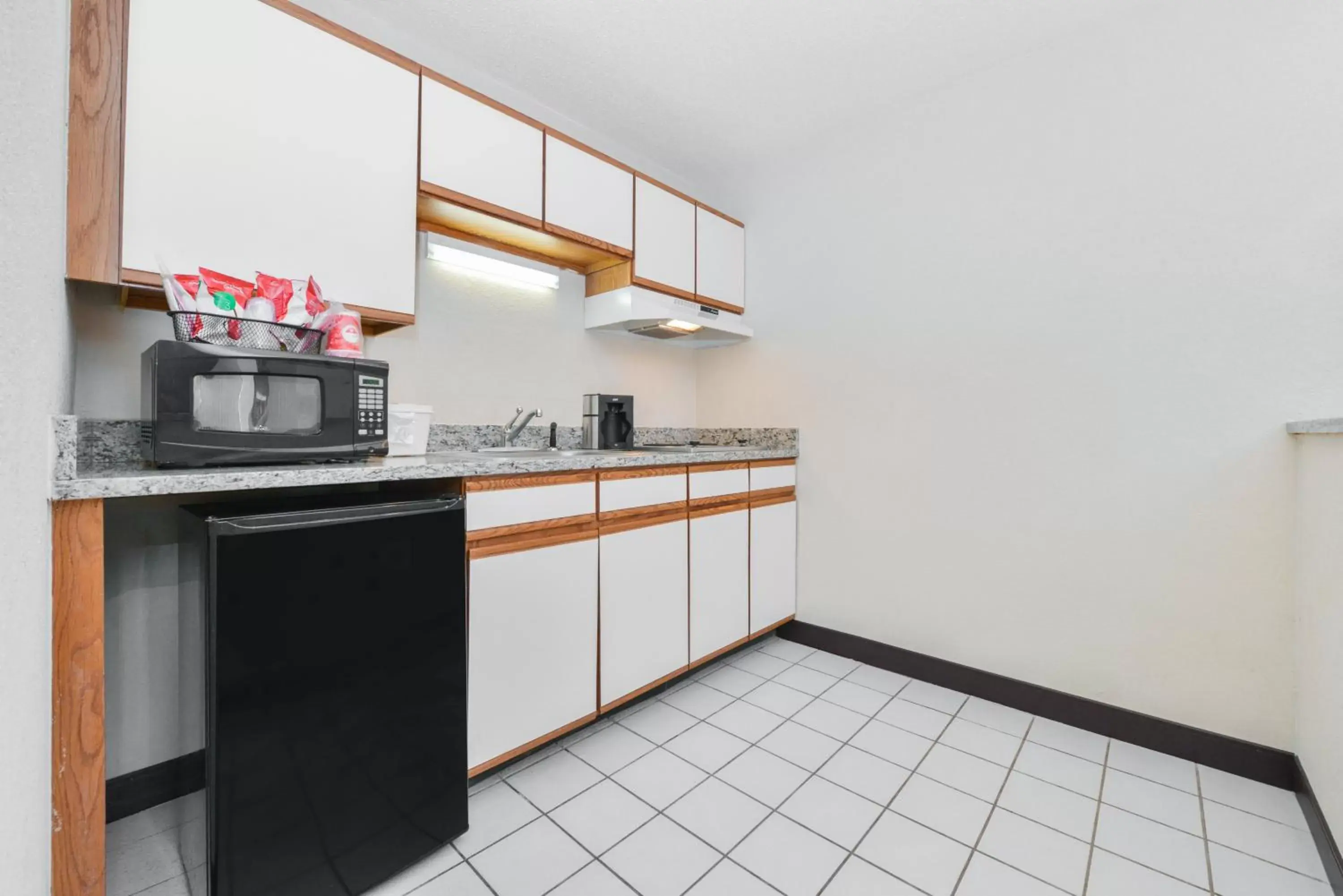 Photo of the whole room in Red Roof Inn PLUS+ & Suites Guilford Photo of the whole room in Red Roof Inn PLUS+ & Suites Guilford