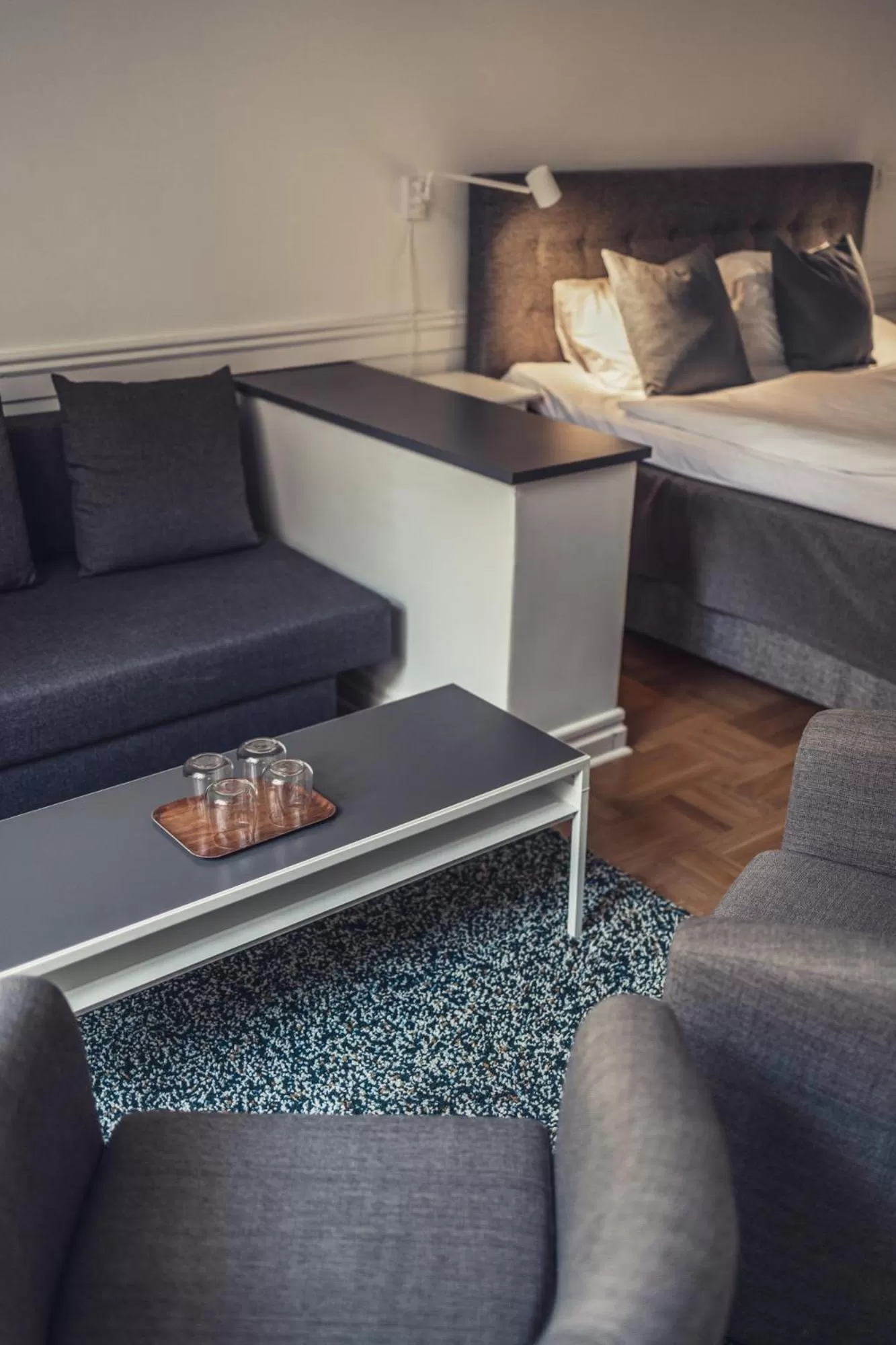 Seating area, Bed in Hotel Poseidon