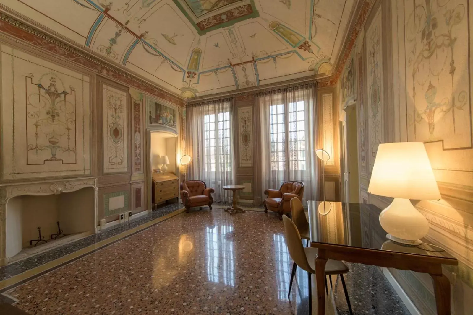 Communal lounge/ TV room in Palazzo Sertorio Suites