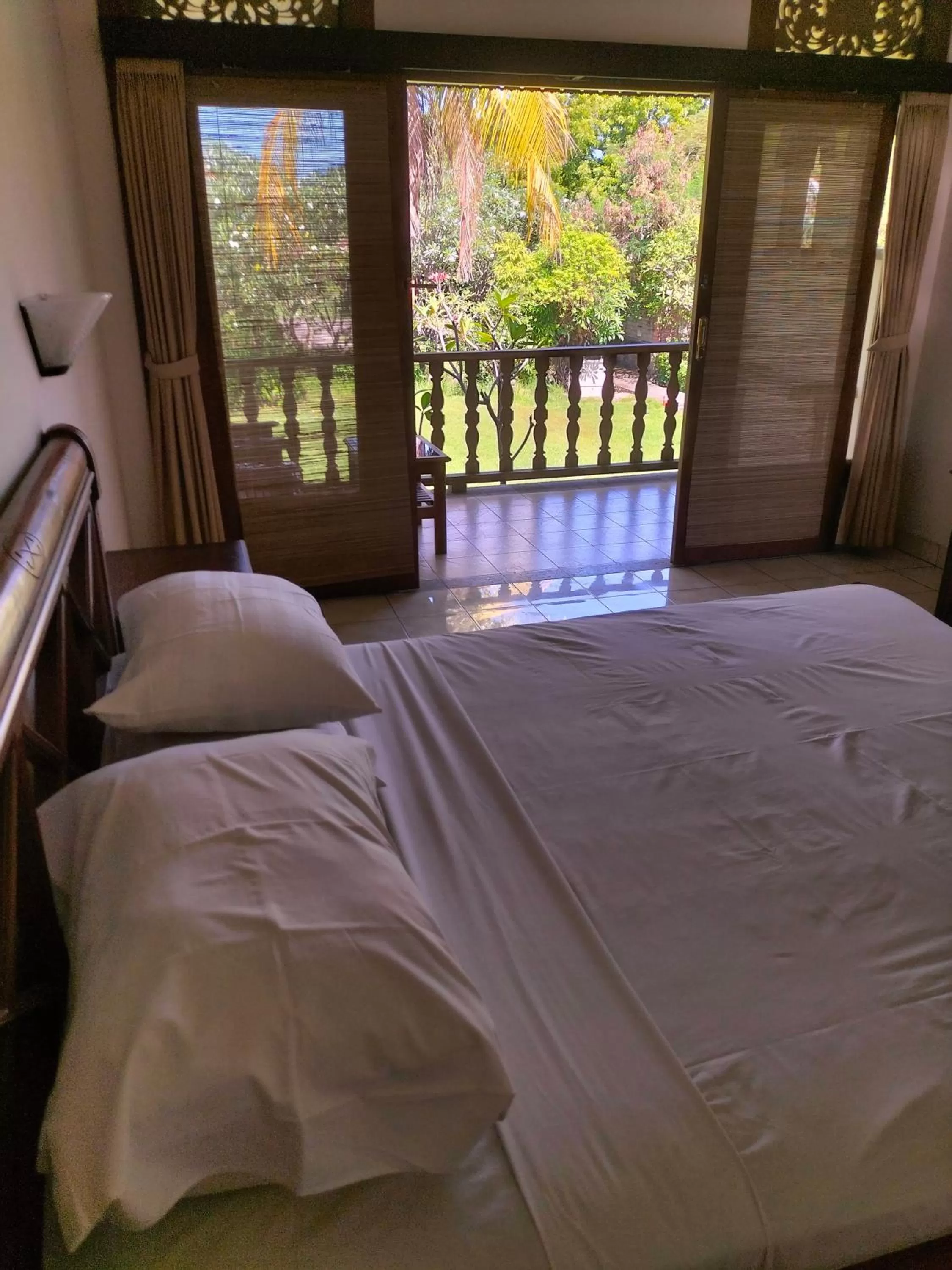 Bed in Nirwana Sea Side Cottages