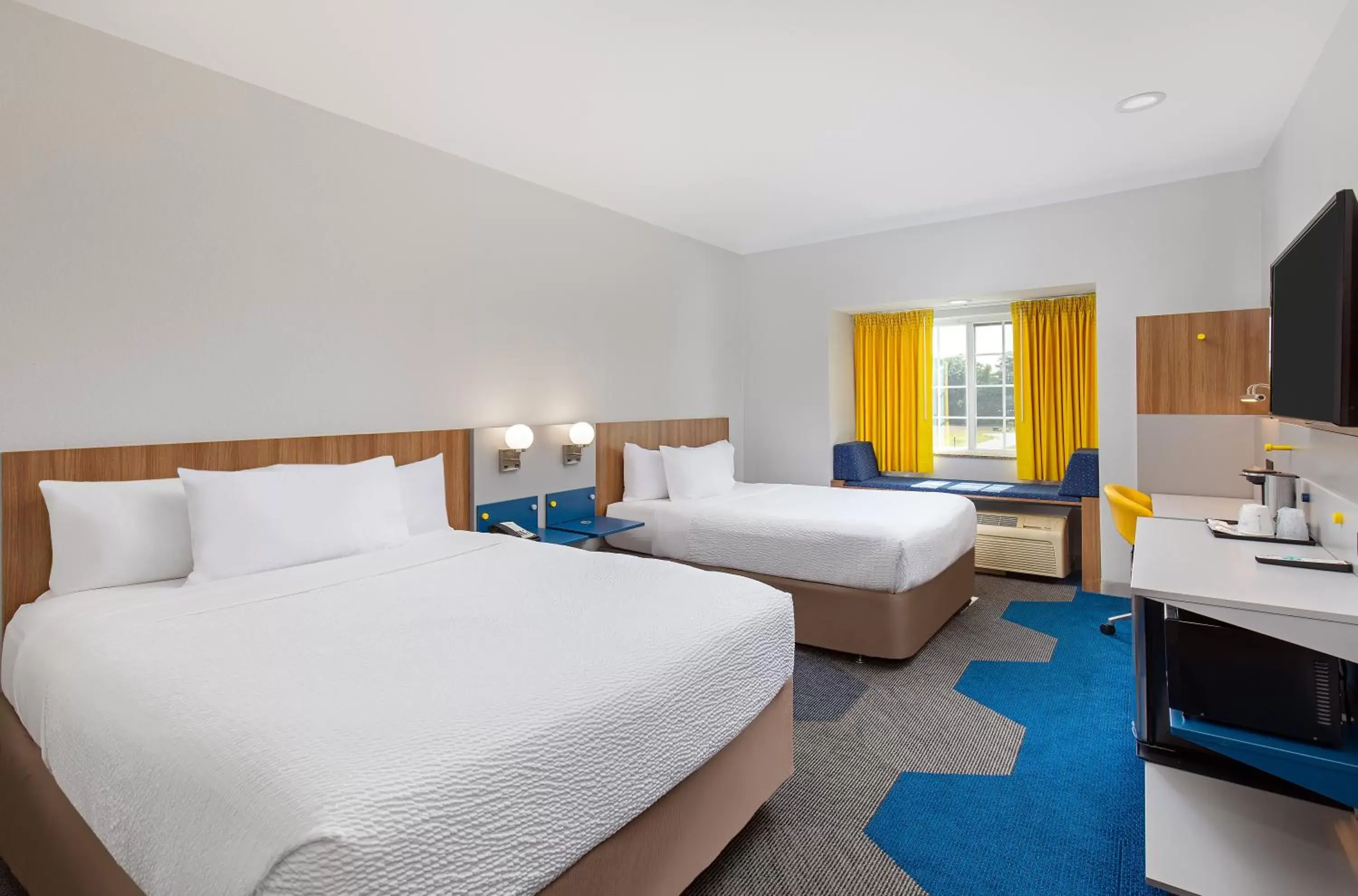 Guests, Bed in Microtel Inn & Suites Columbus North