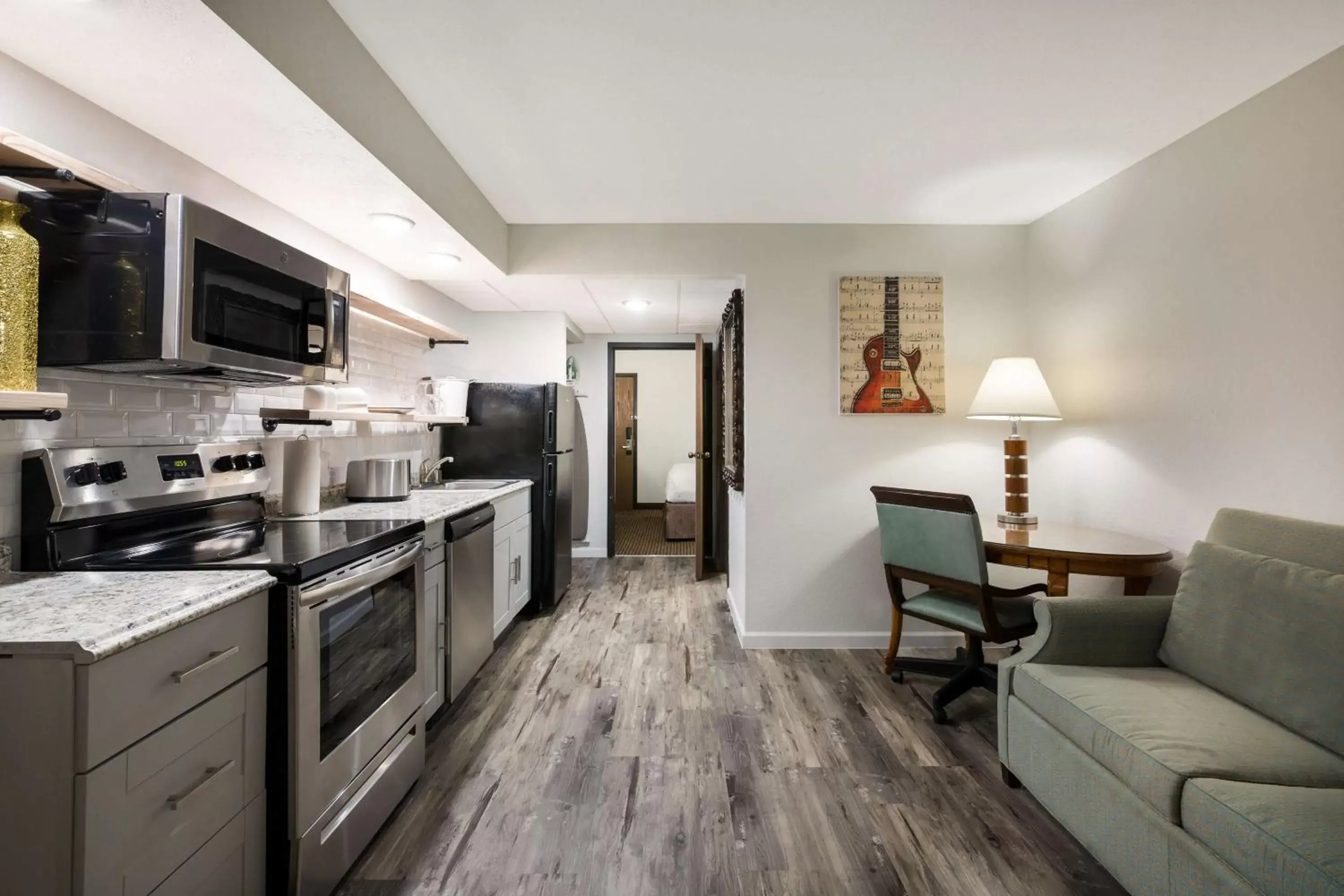 Kitchen or kitchenette, Kitchen/Kitchenette in Revel Hotel Minot - SureStay Collection by Best Western