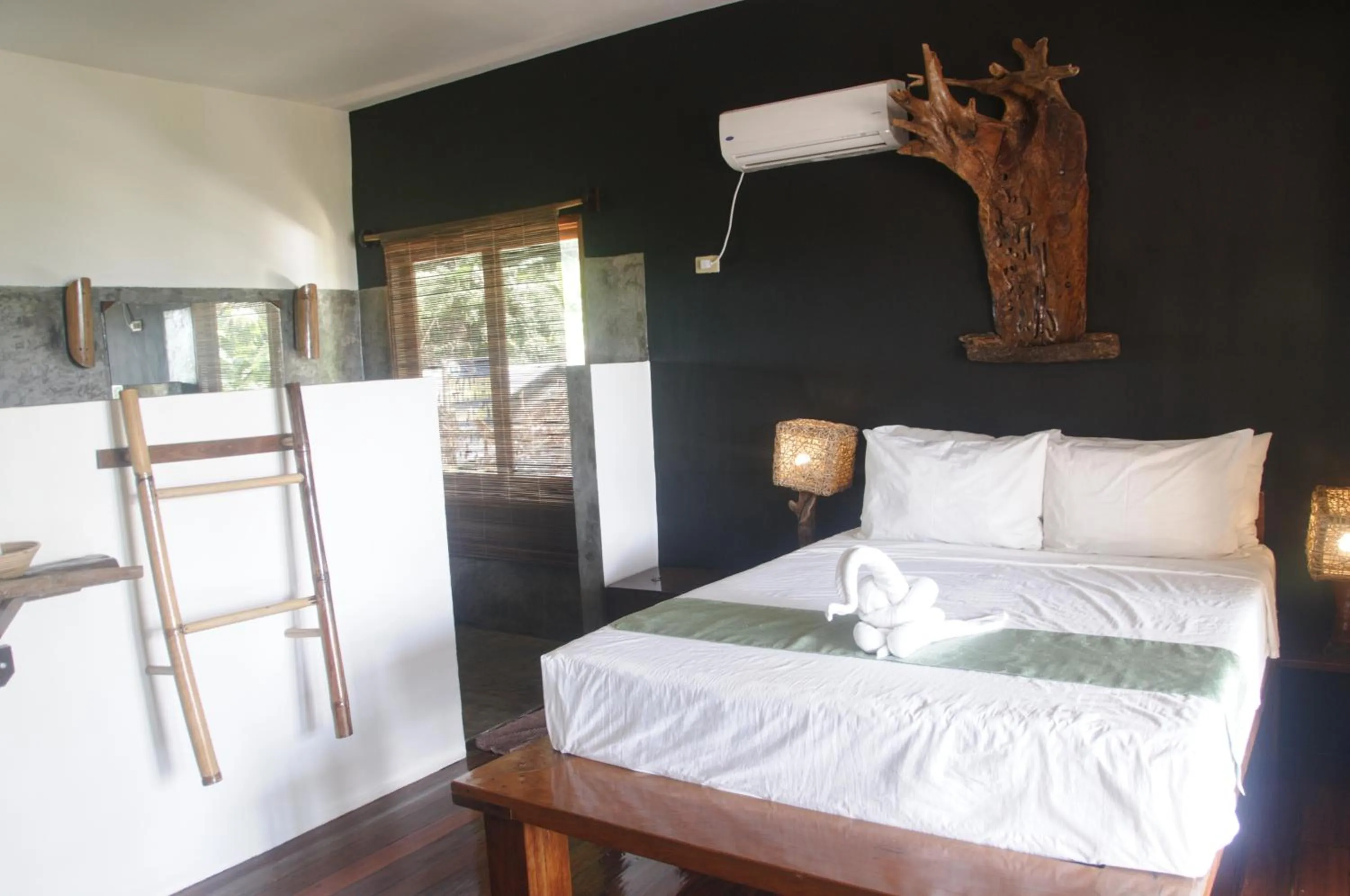 Bed in Happiness Boutique Resort El Nido