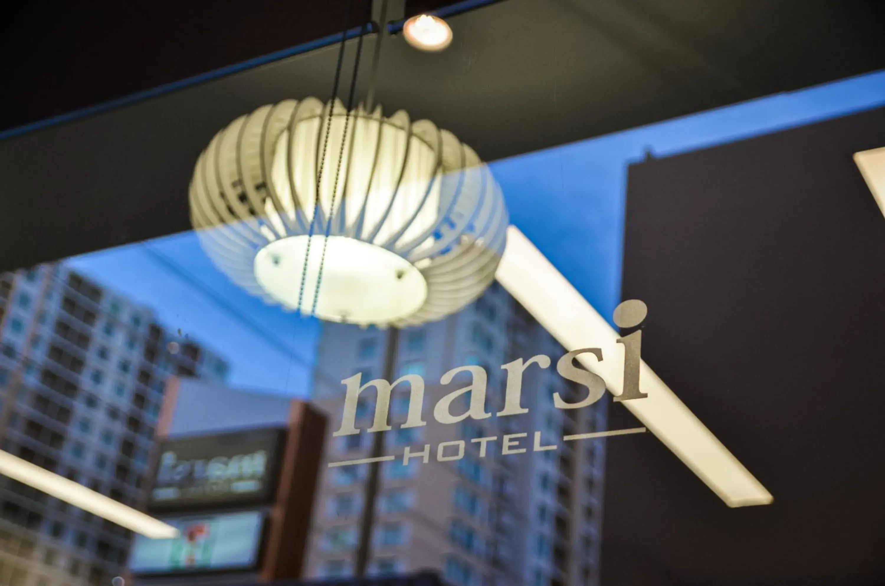 Property logo or sign in Marsi Hotel