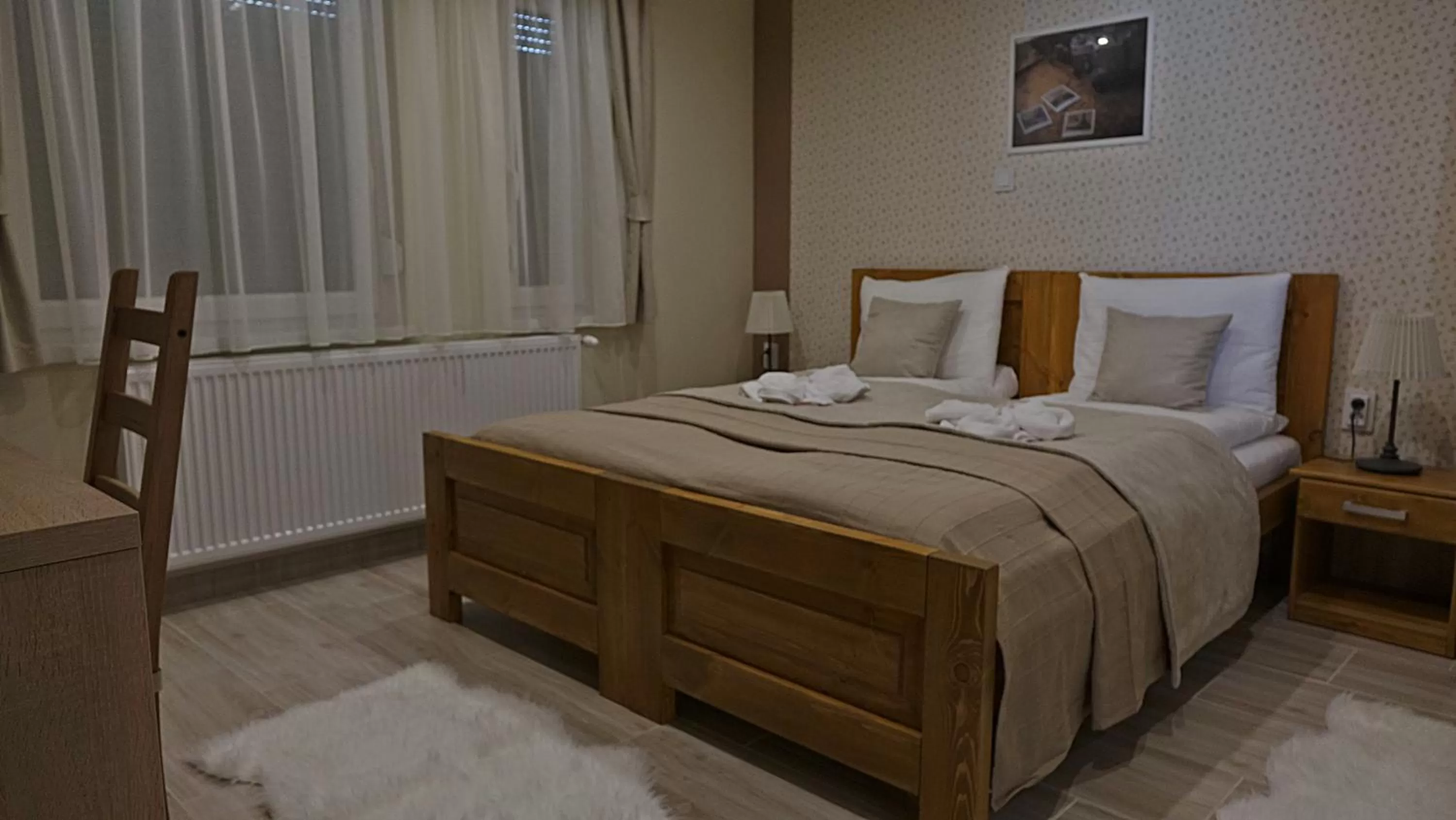 Bed in Alice Panzió Gold