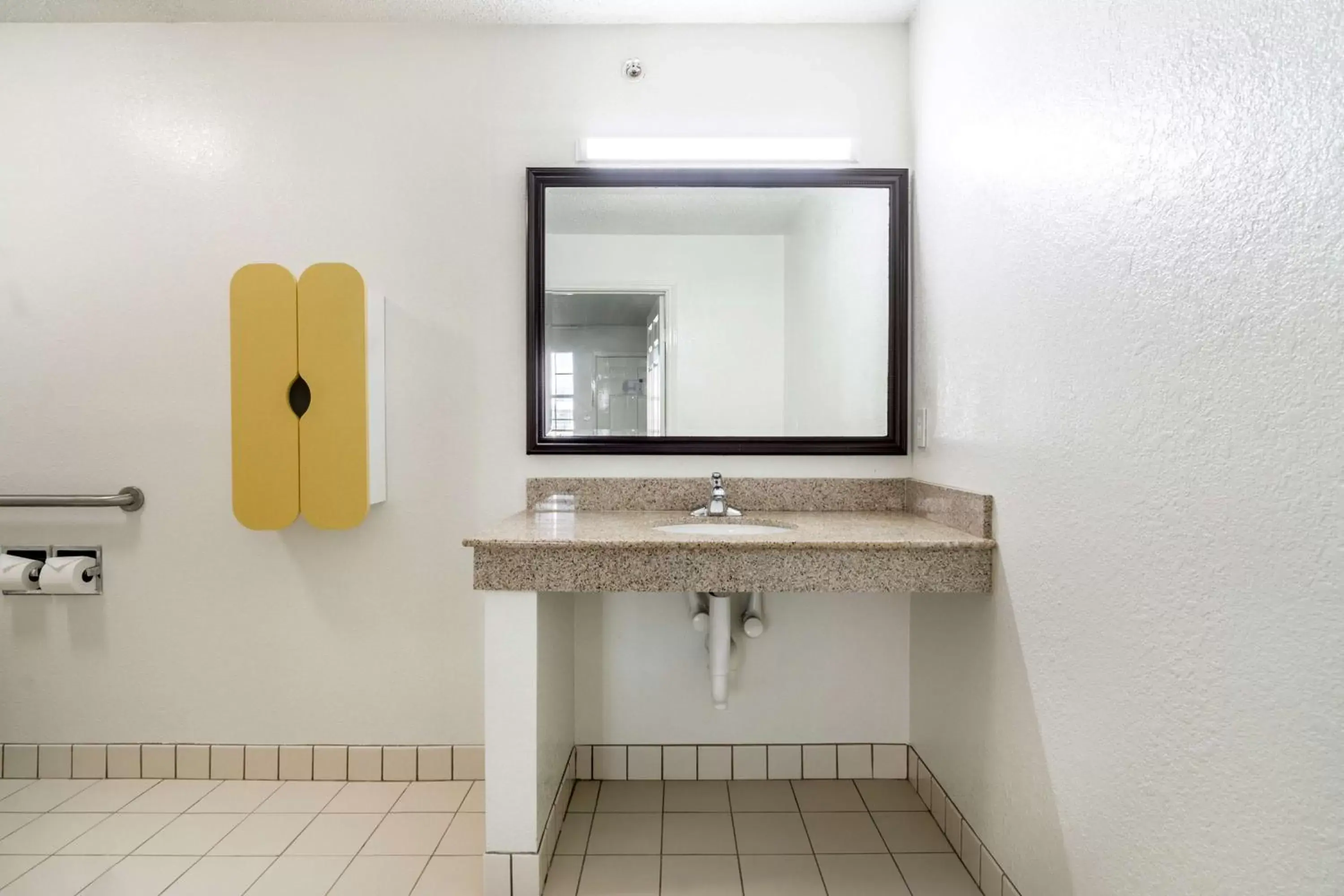 Photo of the whole room, Bathroom in Studio 6-Plano, TX - Dallas - Plano Medical Center