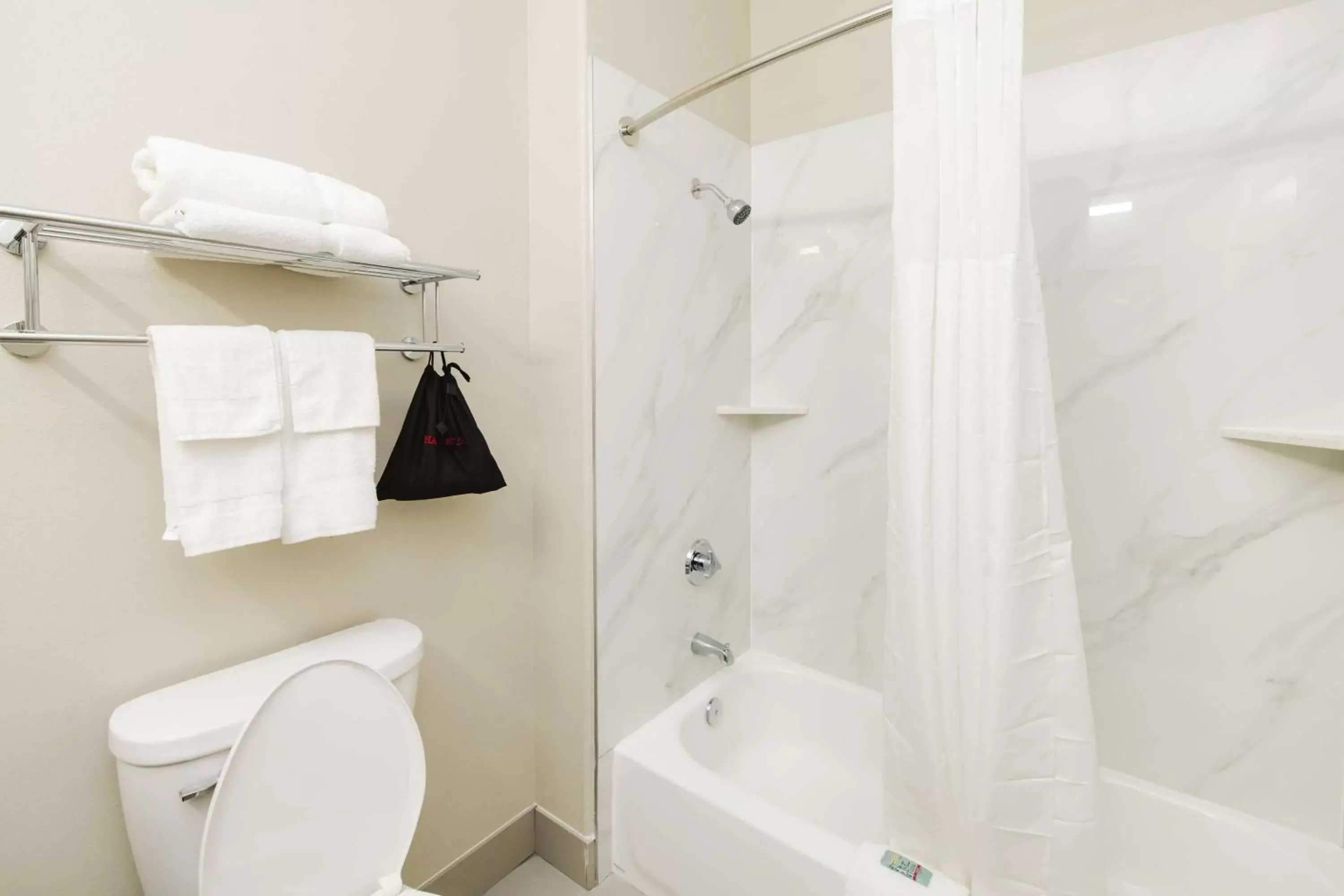 Bathroom in SureStay Studio by Best Western Conroe Downtown