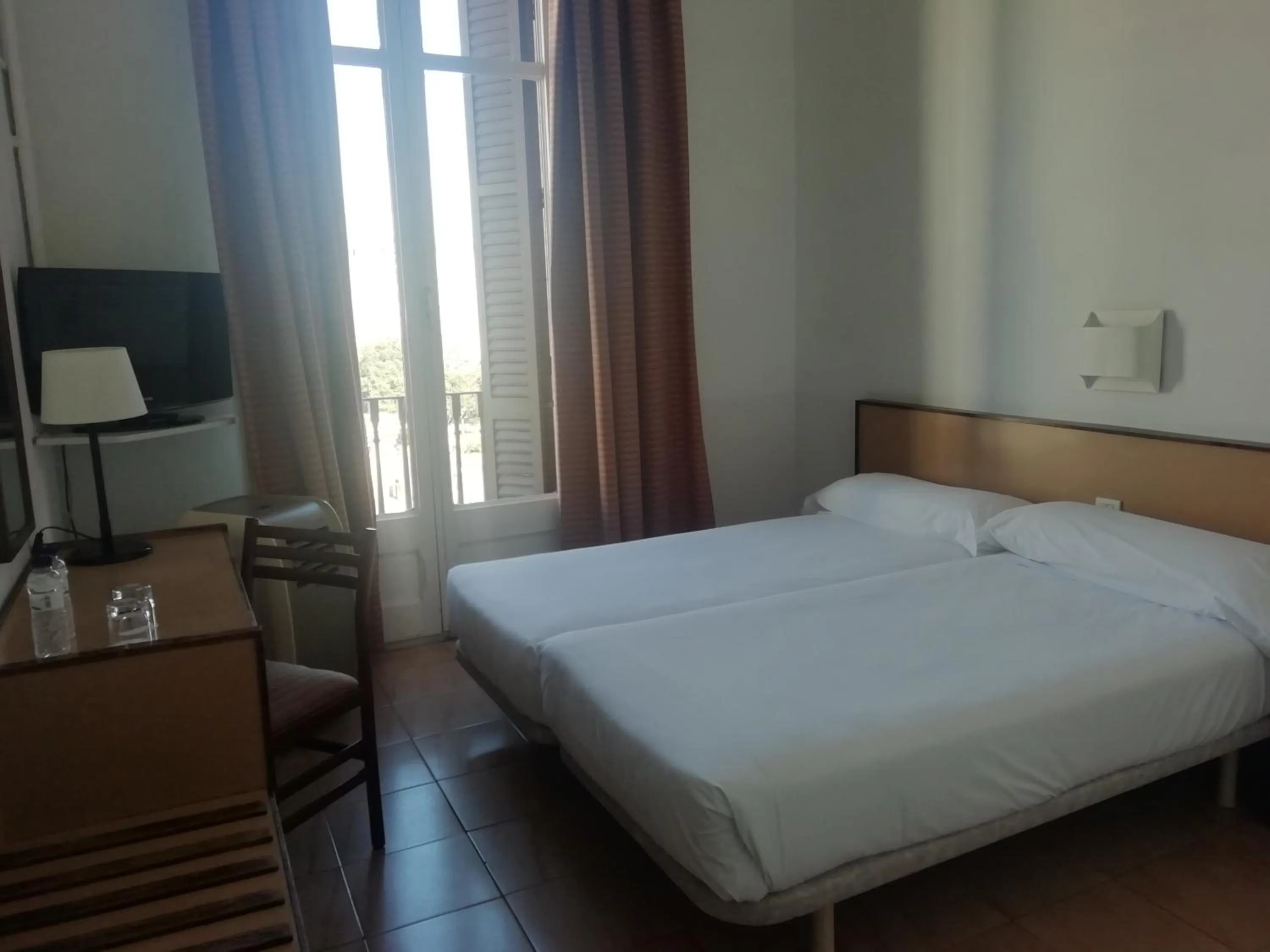 Bed in Hotel Monegal