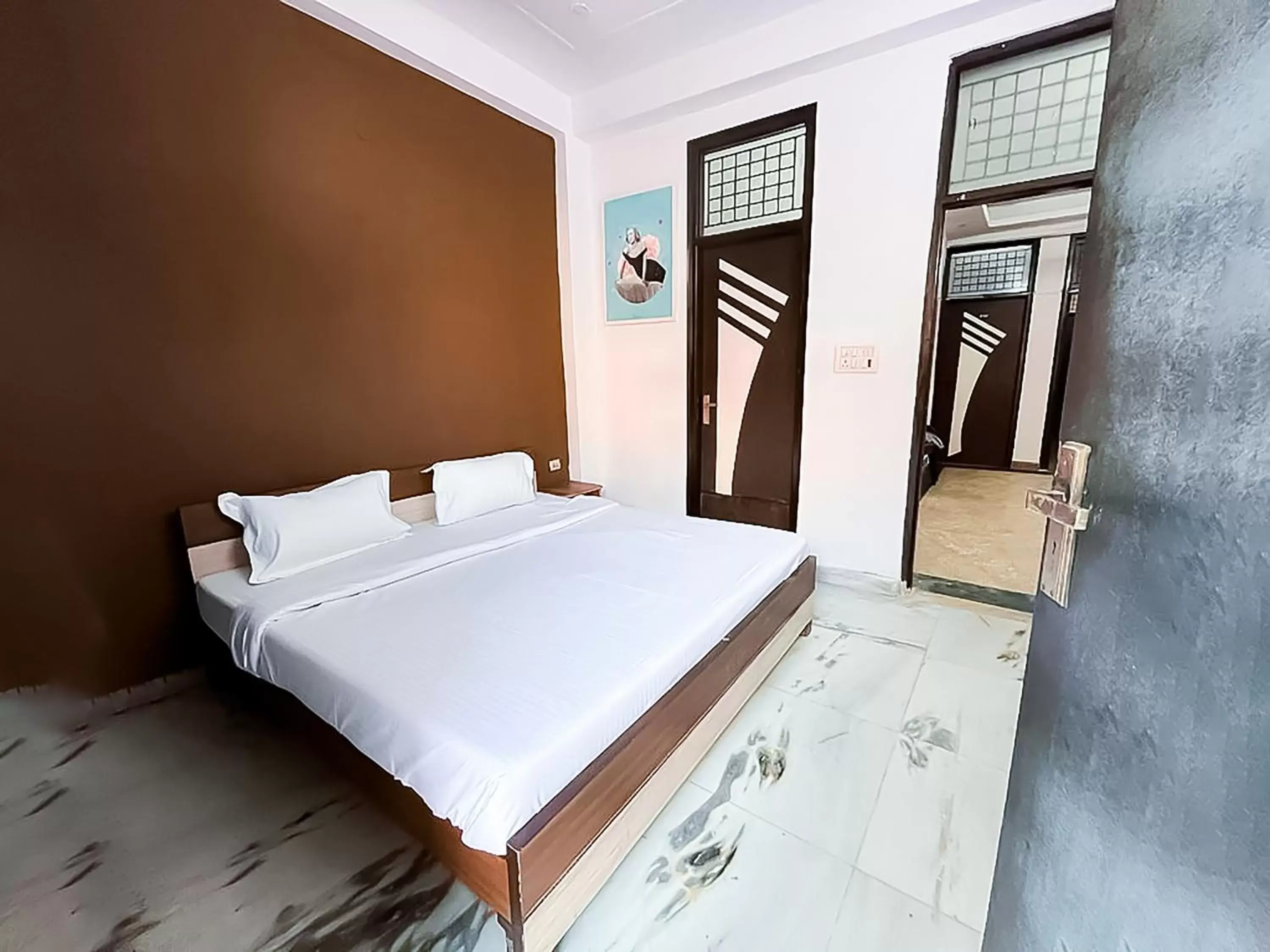 Deluxe Double Room (2 Adults + 1 Child) in Roomshala 115 Satguru Residency - Indrapuram Deluxe Double Room (2 Adults + 1 Child) in Roomshala 115 Satguru Residency - Indrapuram