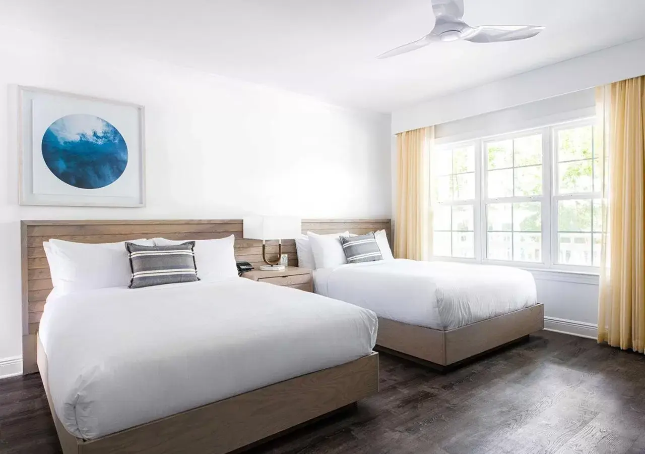 Queen Room with Two Queen Beds and Partial Water View in Parrot Key Hotel & Villas