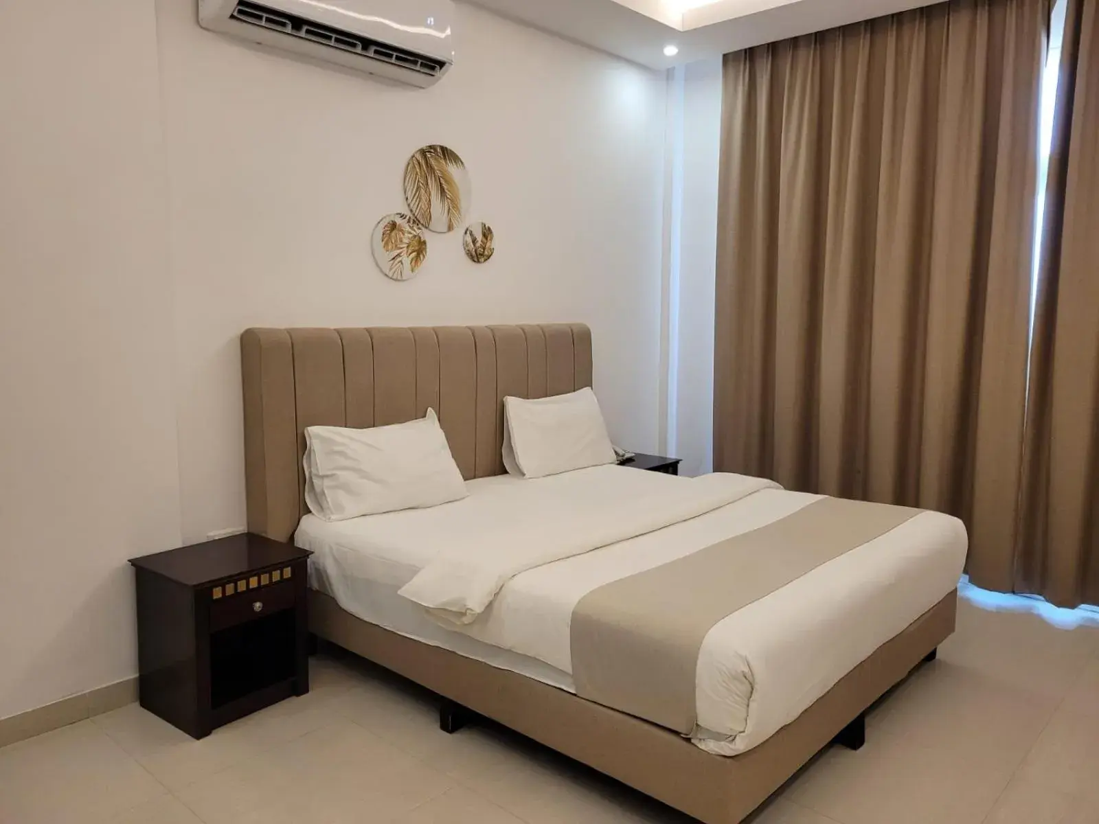 Bed in Salalah Beach Resort Hotel