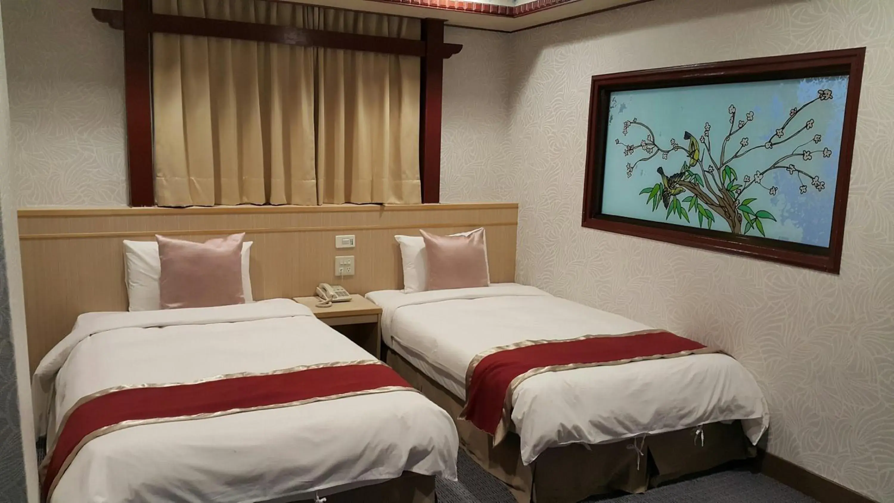 Bed in Mei-Hua Hotel