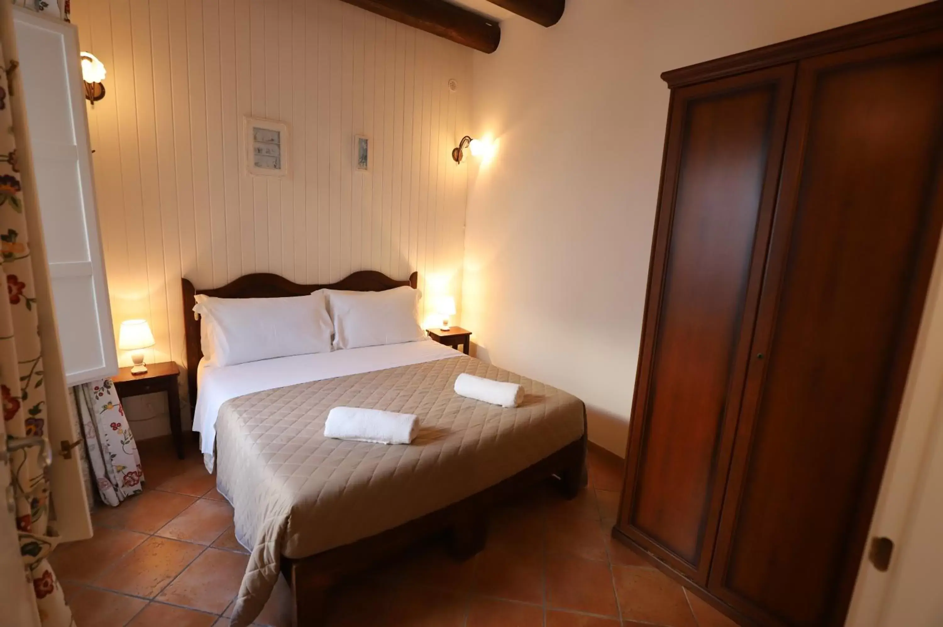 Bed in Italiana Resort Magnolia